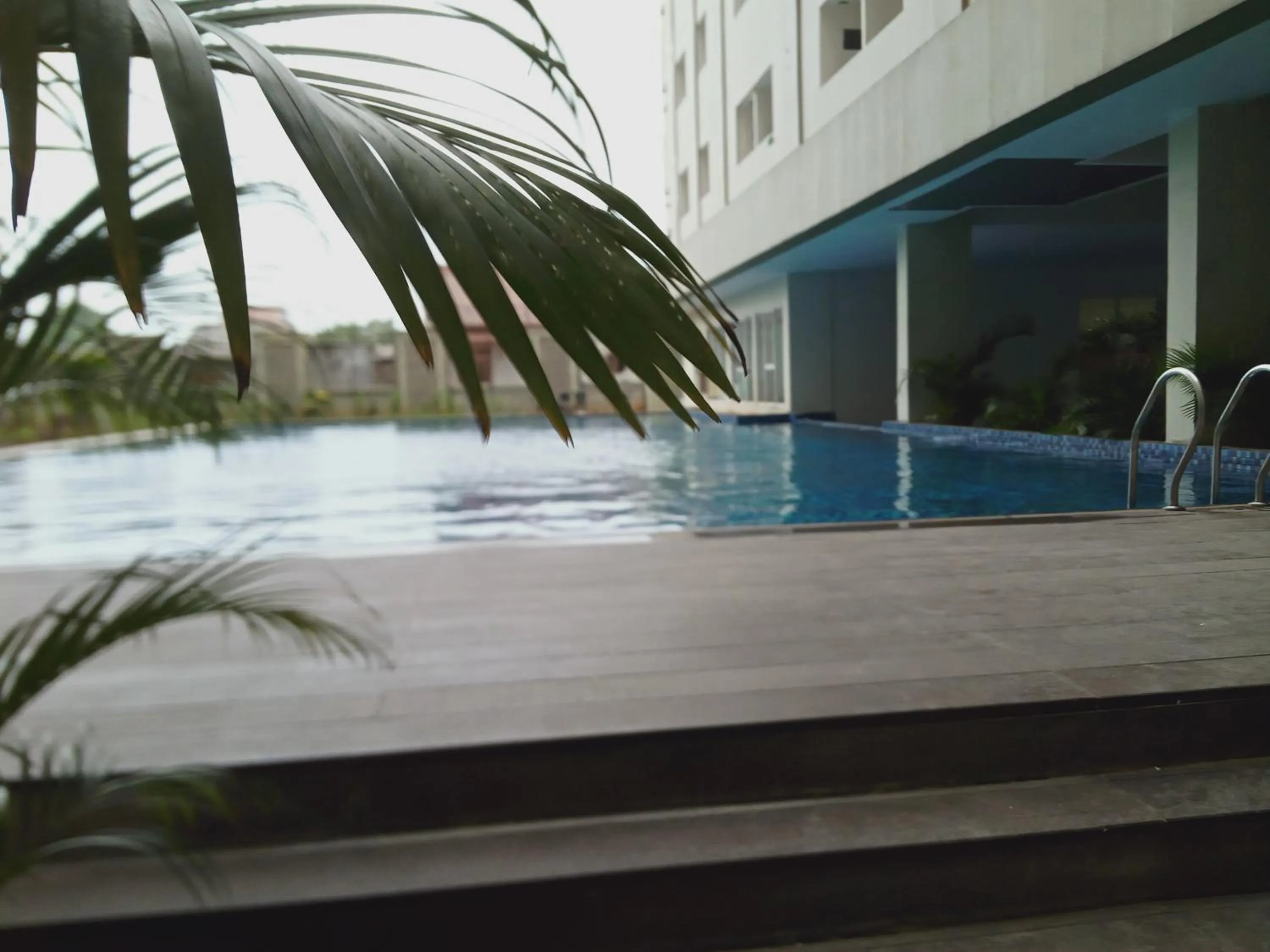 Swimming pool in De Green Inn Serua