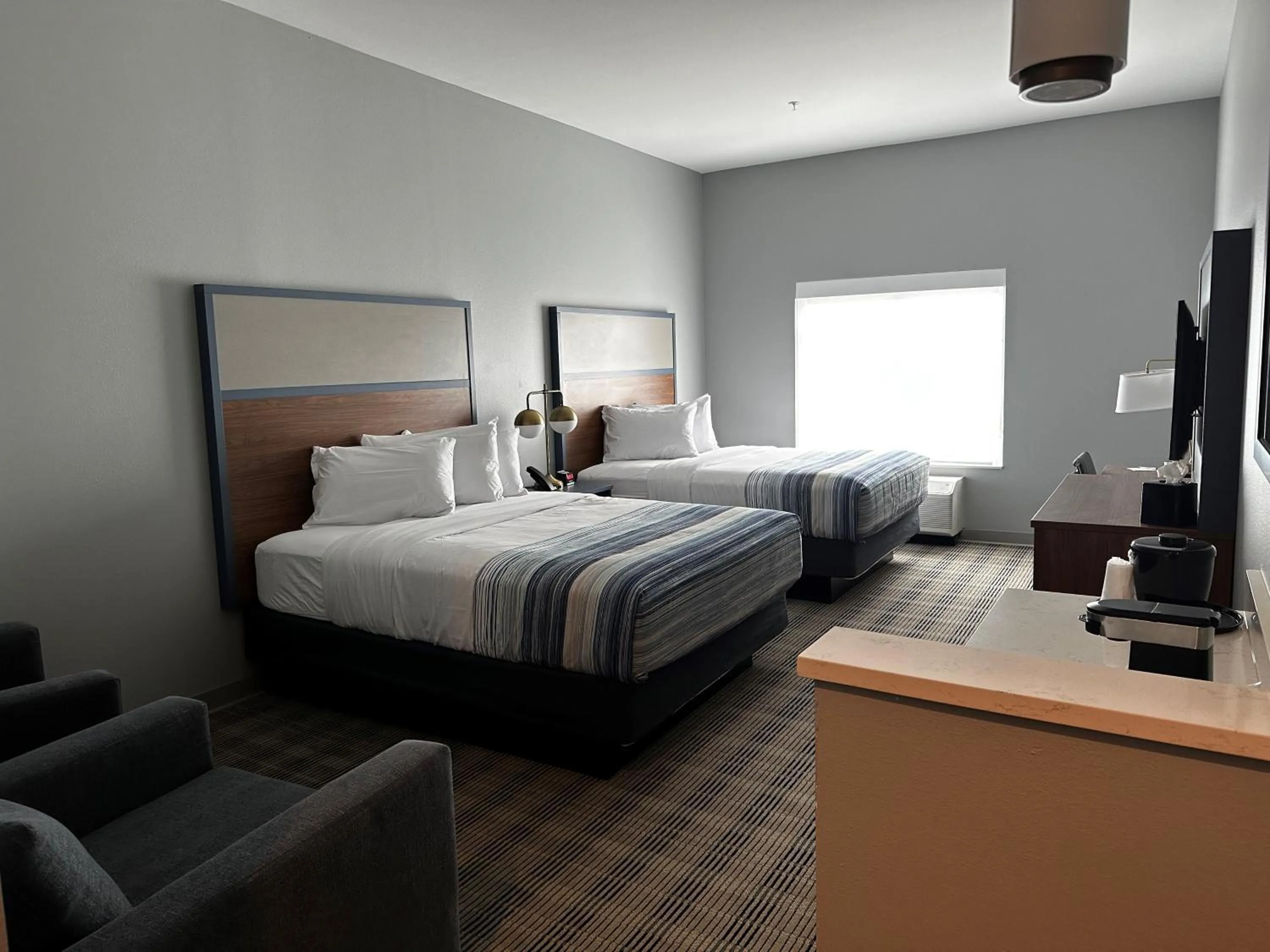 Bedroom, Bed in AmericInn by Wyndham Mountain Home