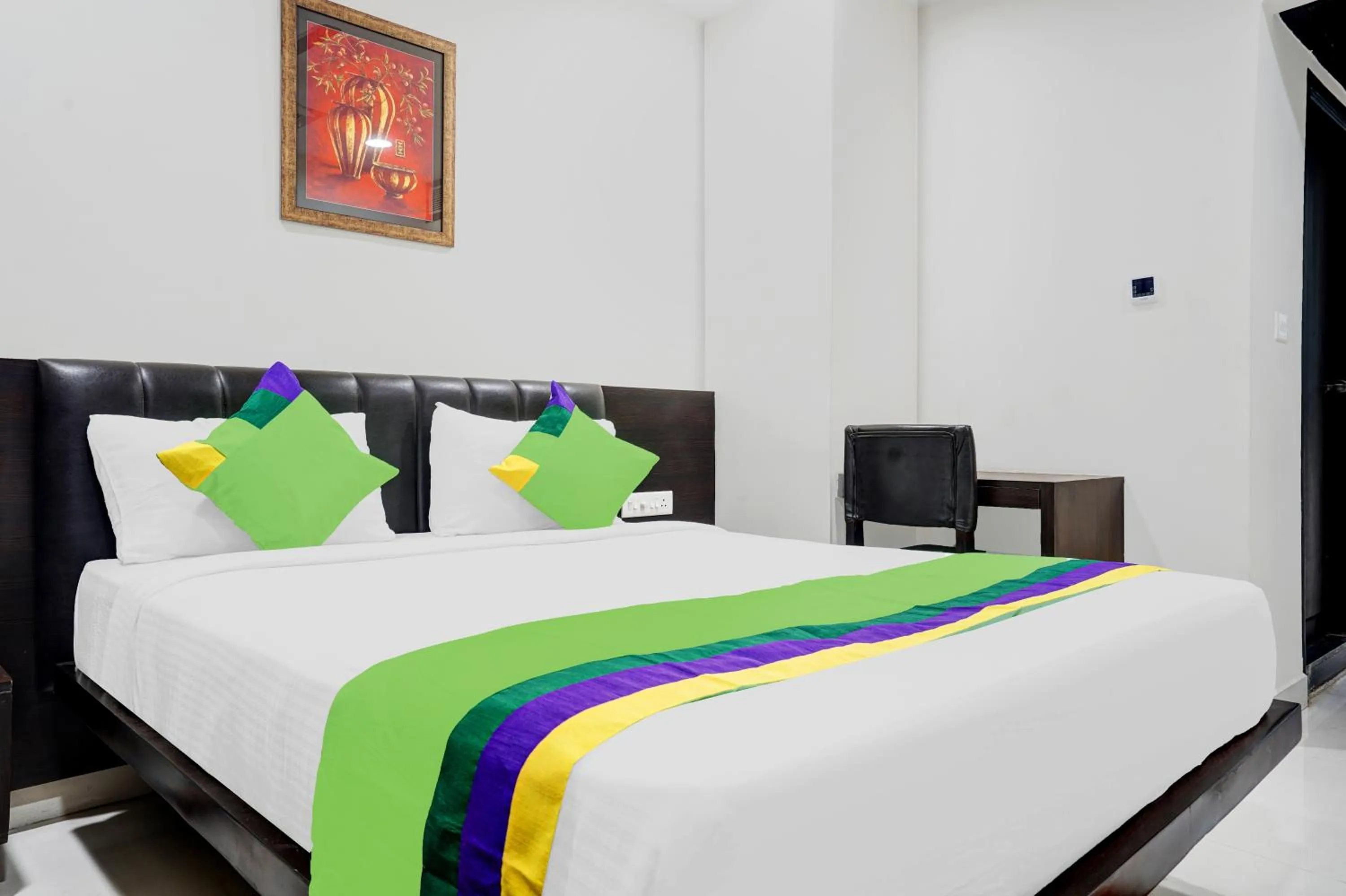 Bedroom in Treebo Madhuvan Grand