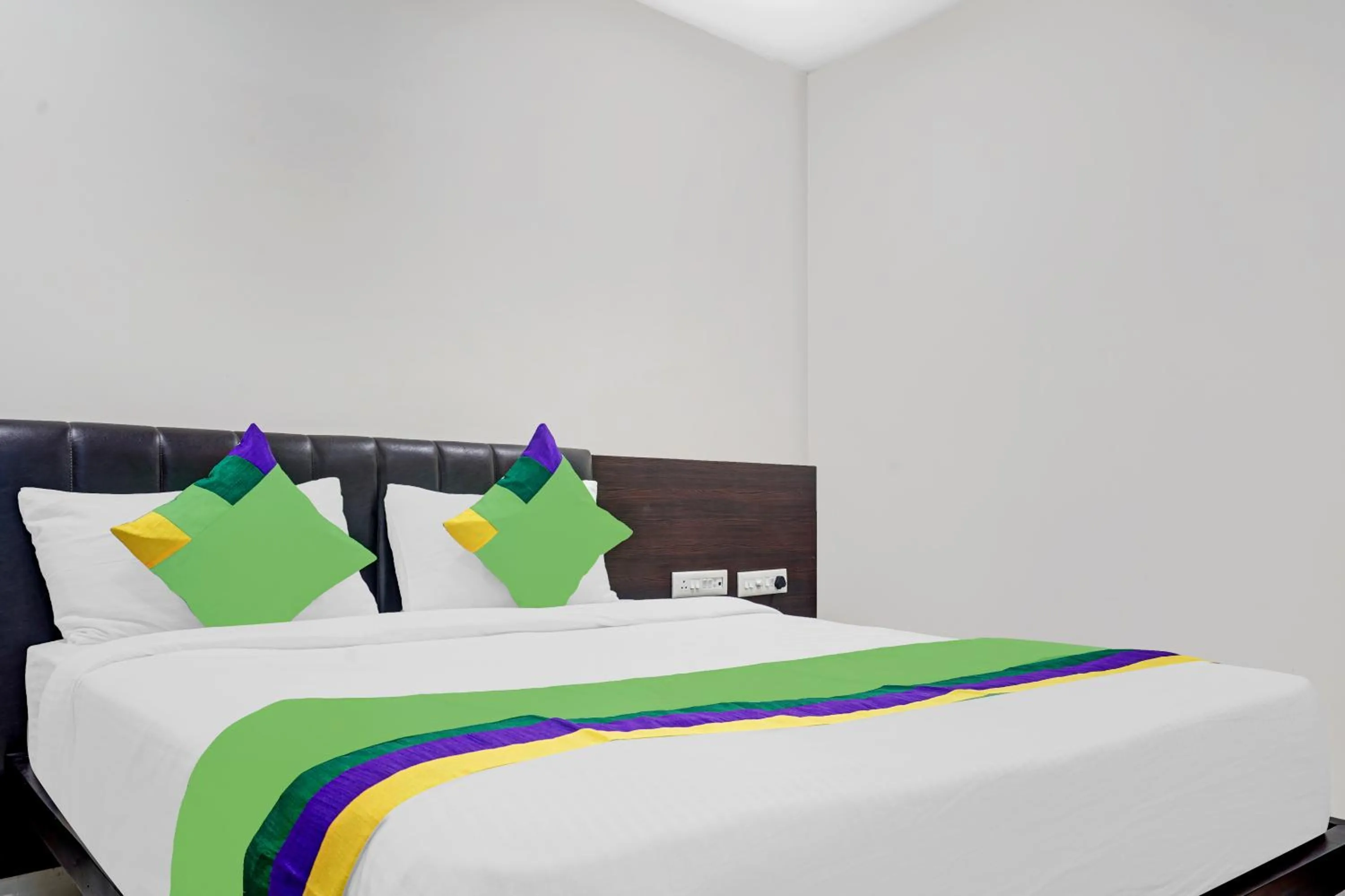 Bedroom in Treebo Madhuvan Grand