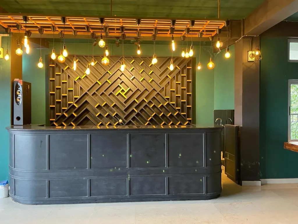 Lounge or bar in La Colline Resort