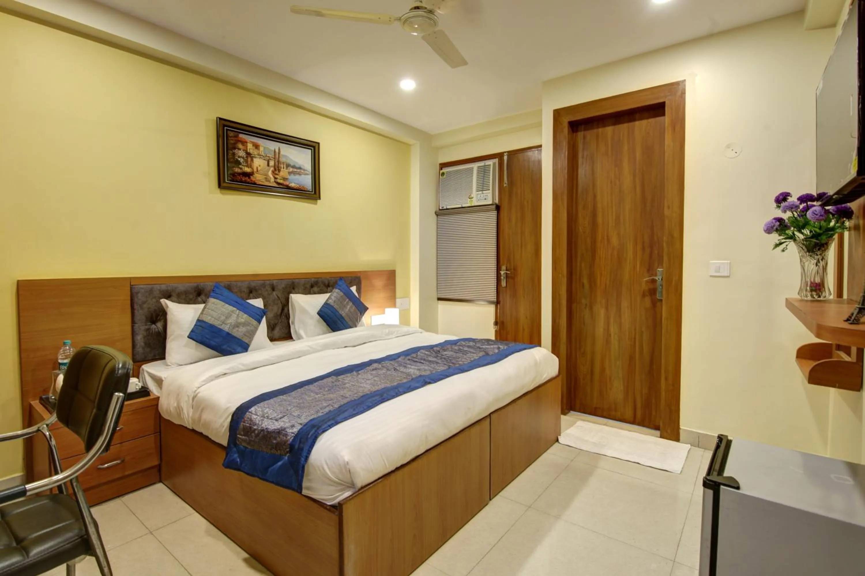 Bed in Hotel TMS Grand