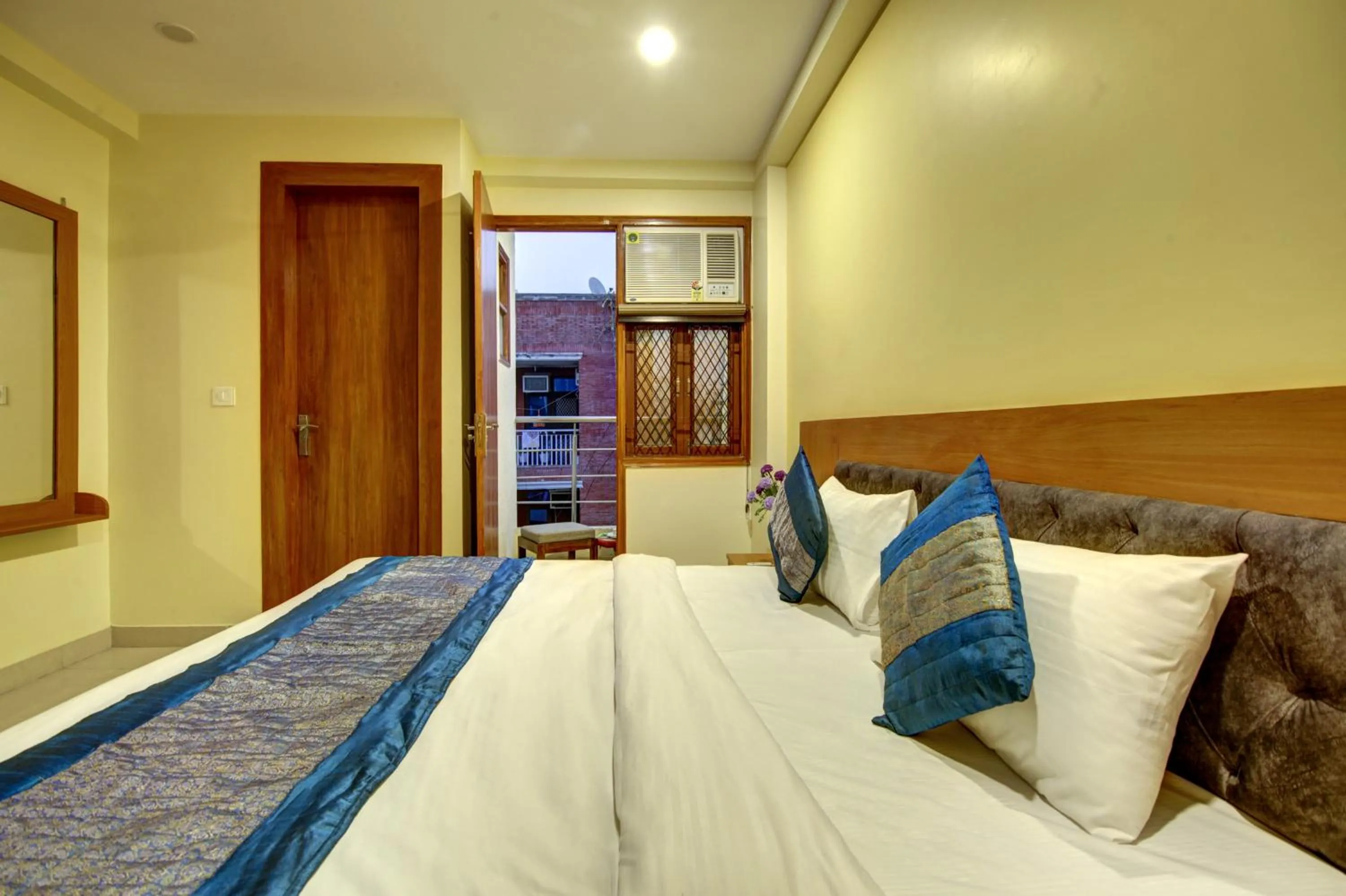 Bed in Hotel TMS Grand