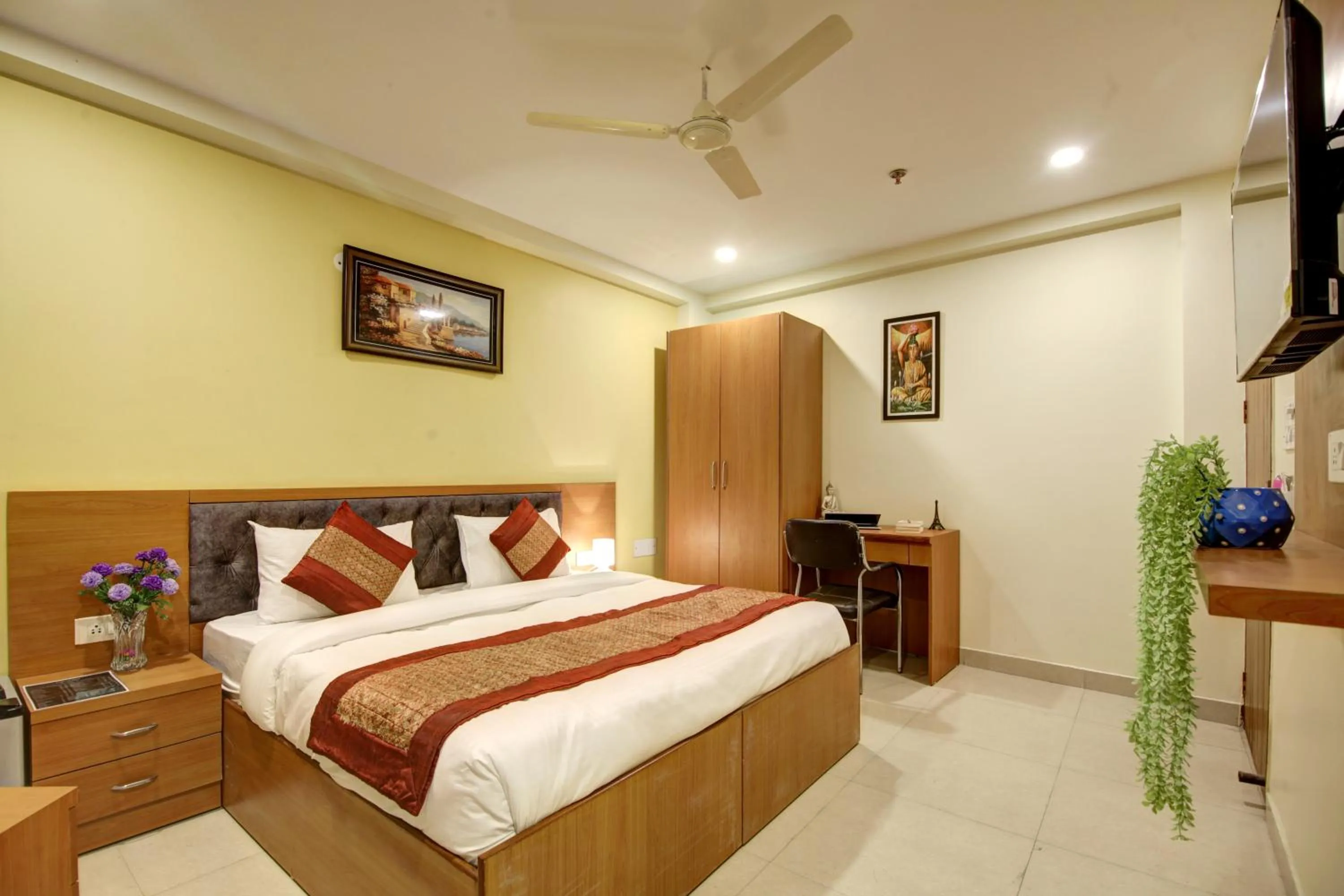 Bed in Hotel TMS Grand