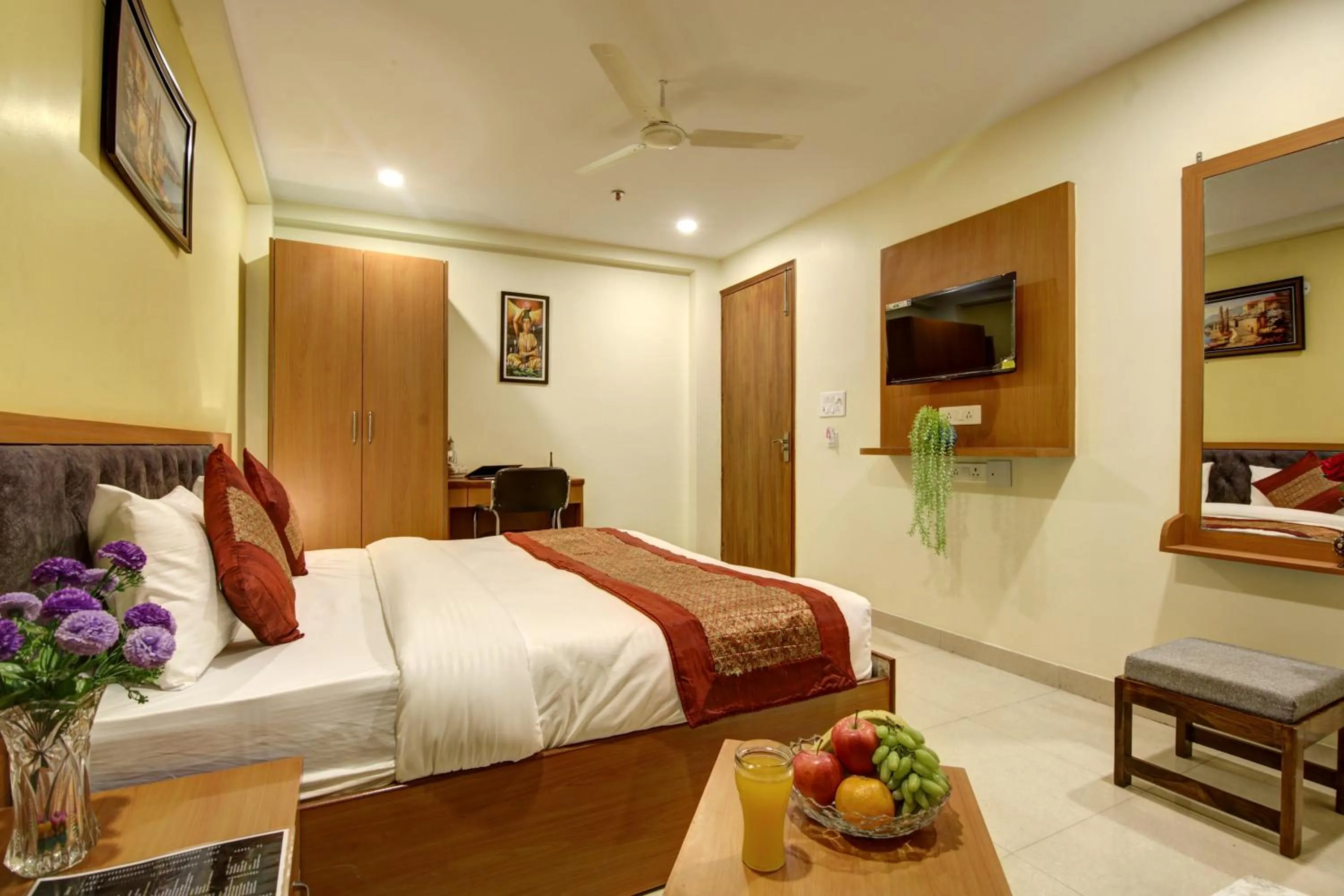 Bed in Hotel TMS Grand