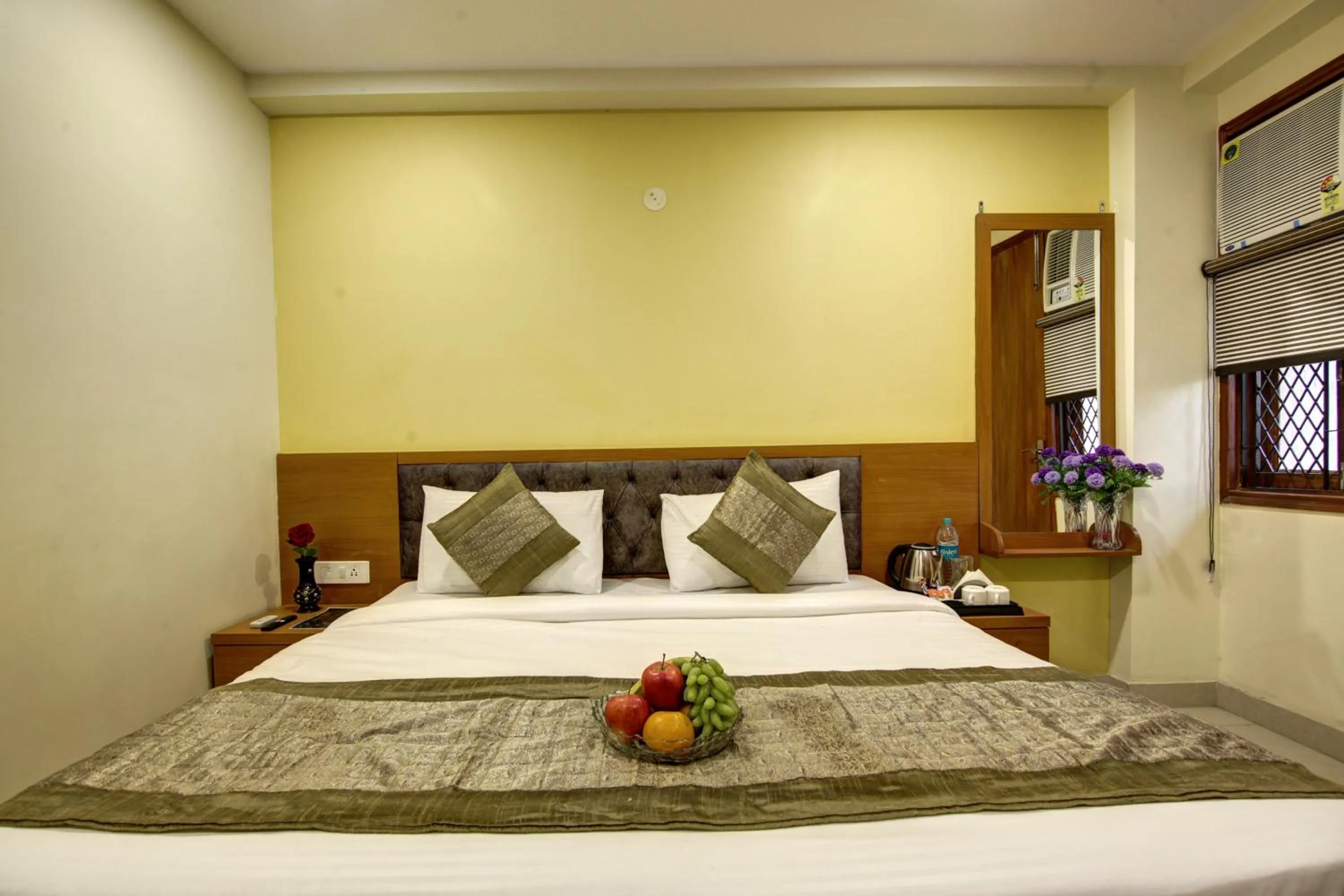 Bed in Hotel TMS Grand