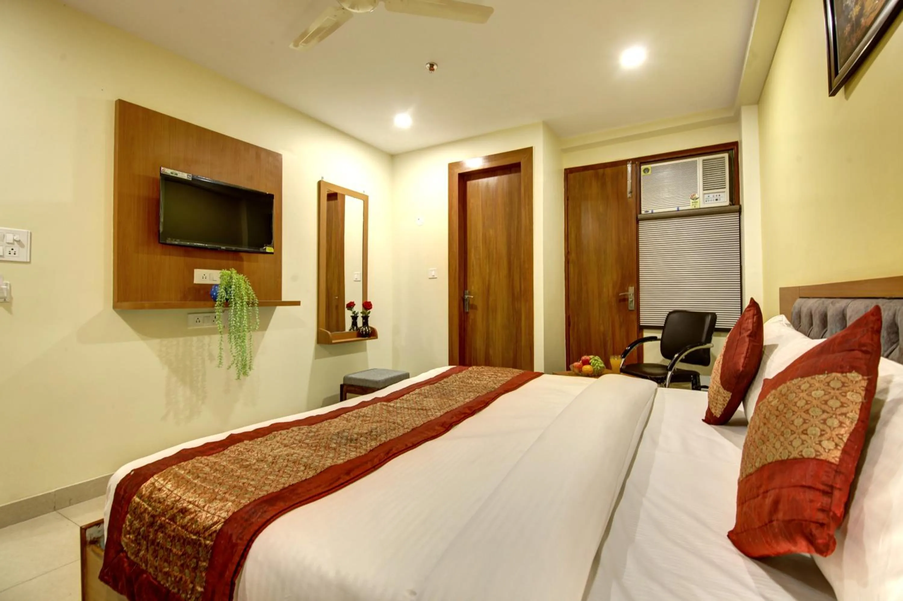 Bed in Hotel TMS Grand