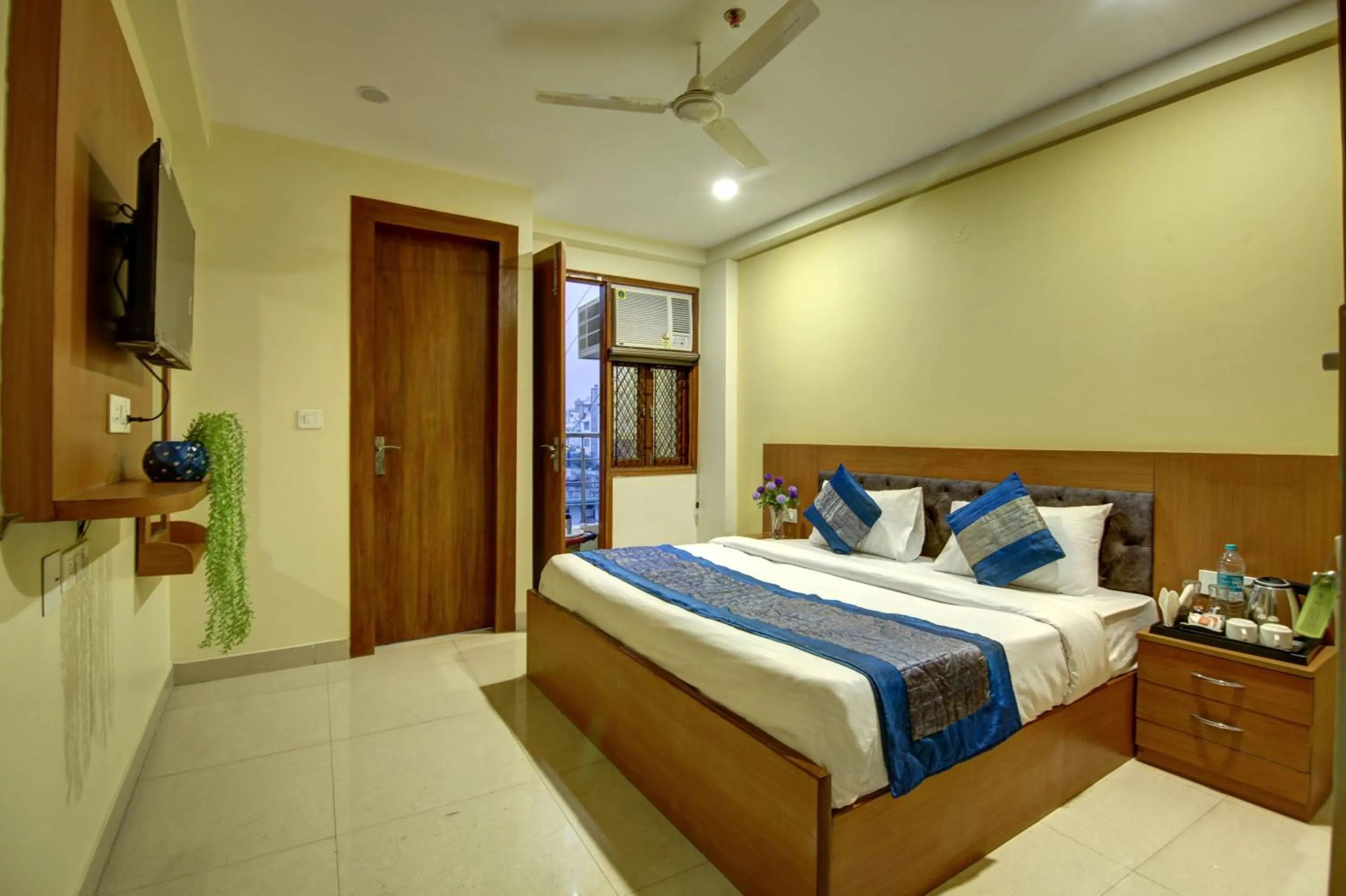 Bed in Hotel TMS Grand