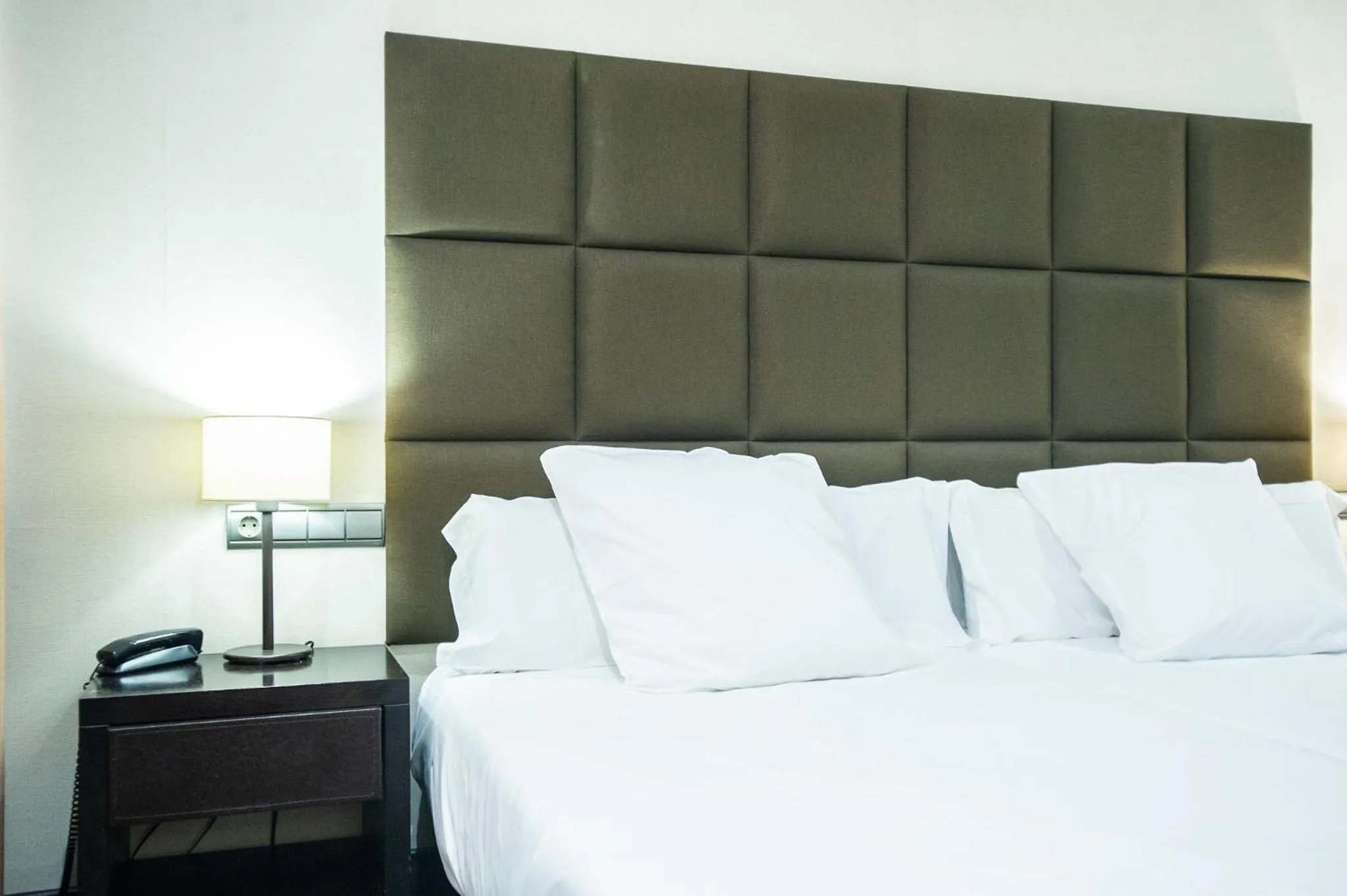 Bed in AZZ Asturias LangreHotel & Spa