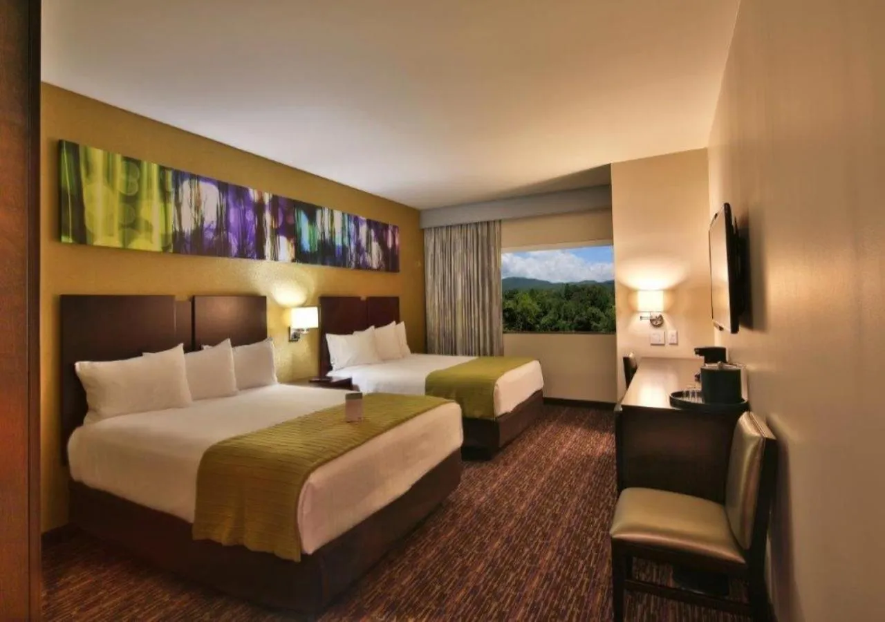 Bedroom, Bed in Harrah's Cherokee Valley River, A Caesars Destination