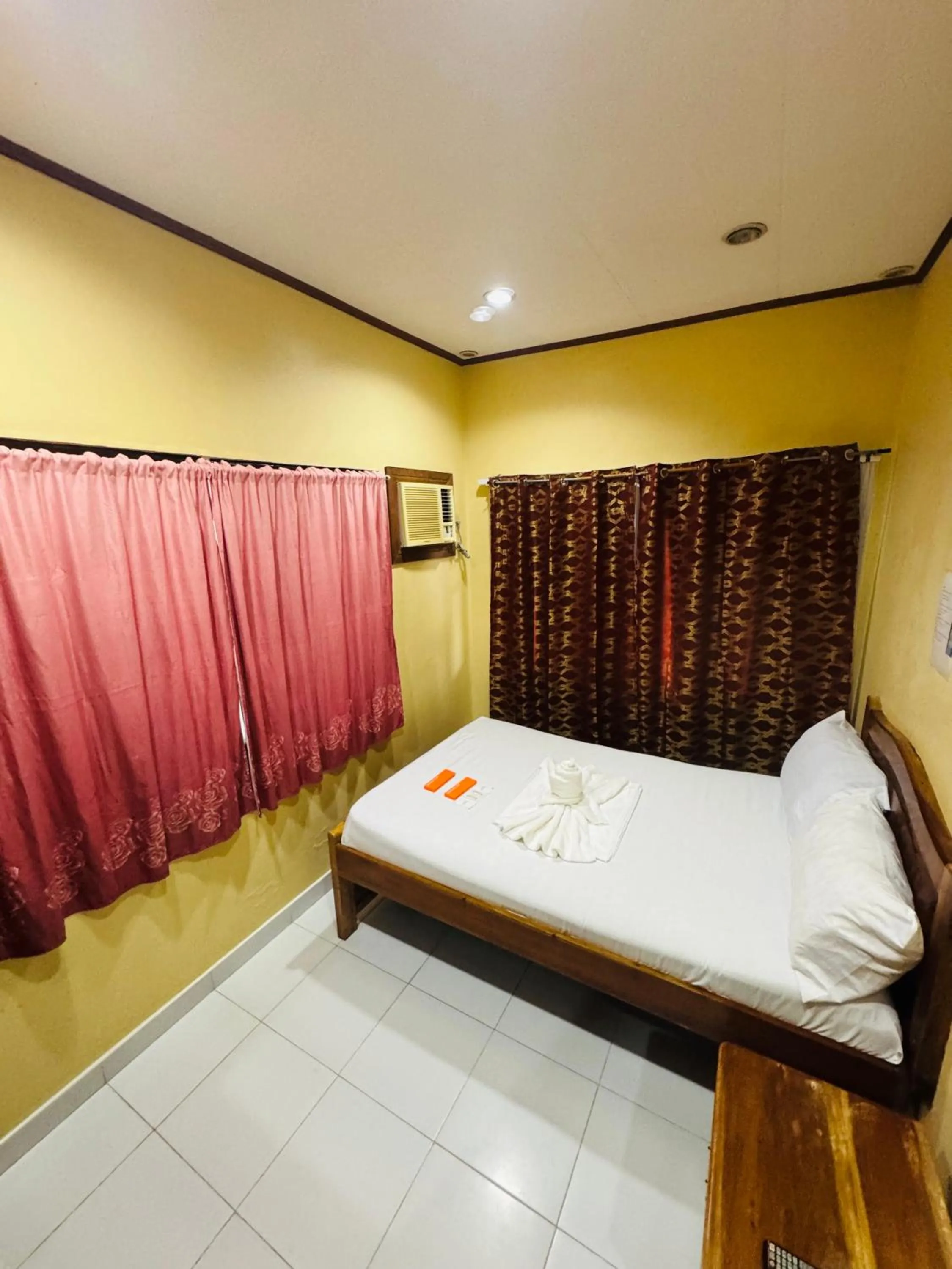 Bed in La-Familia Guest House