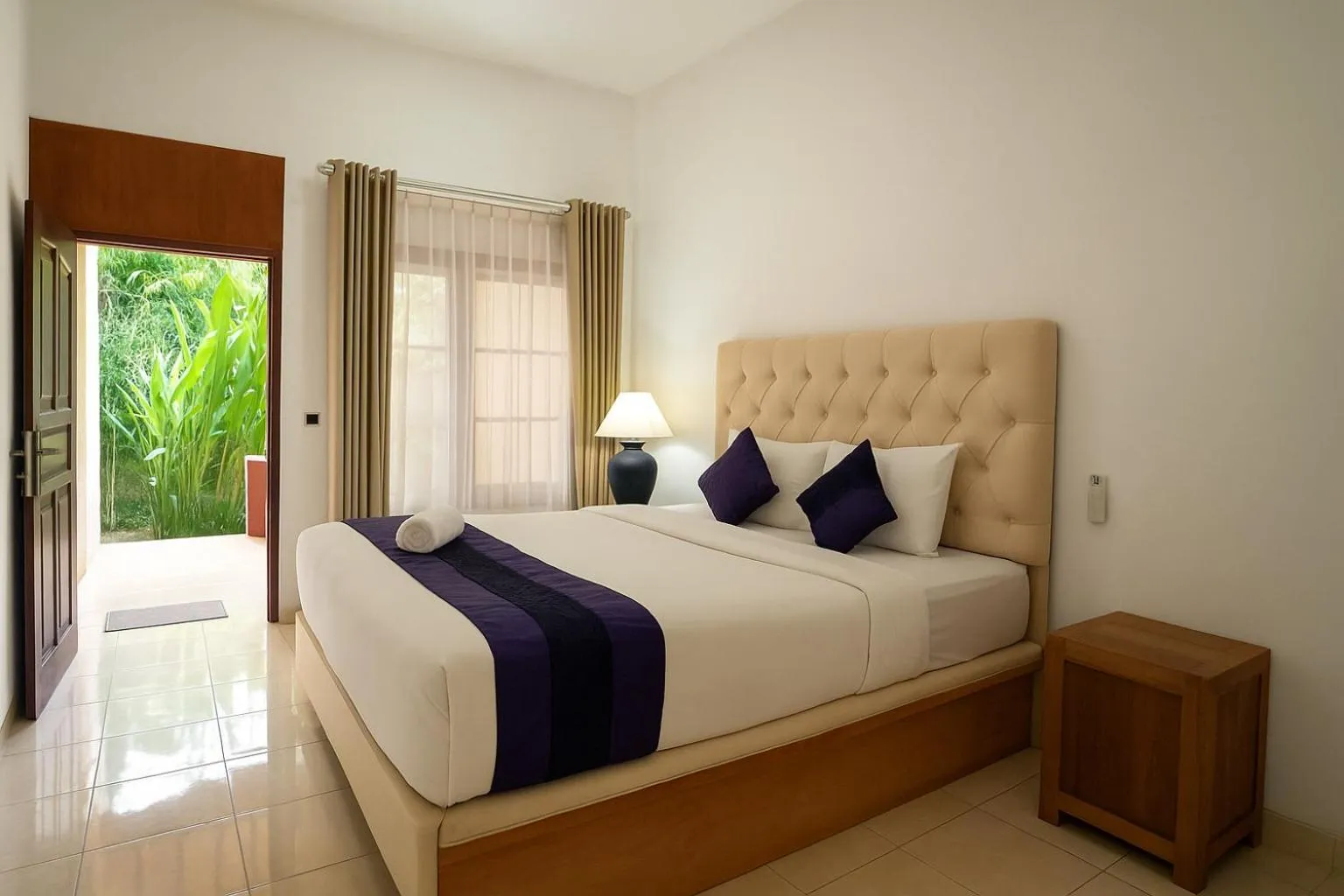 Bed in Matahari Inn Kuta Lombok