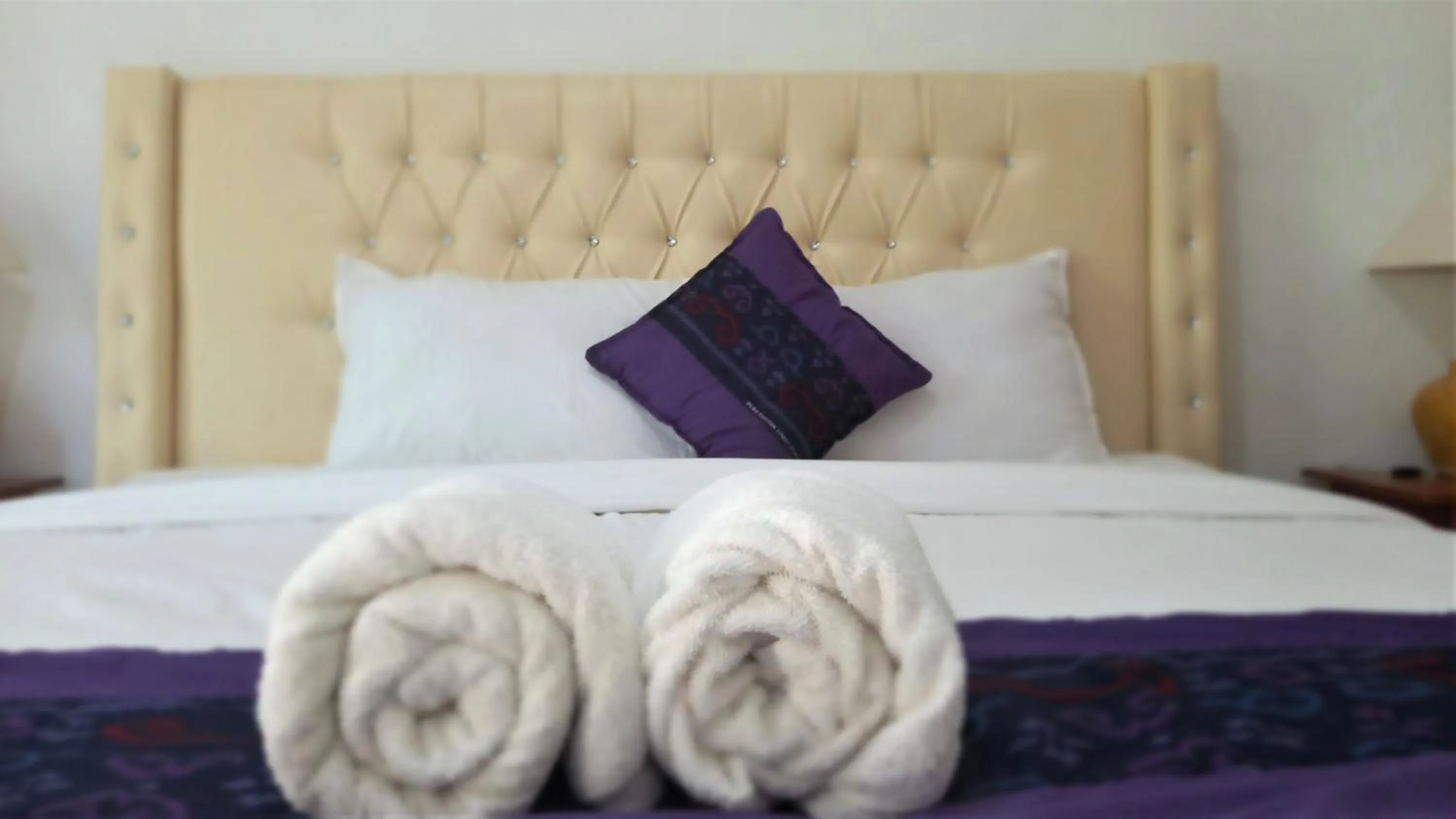 Bed in Matahari Inn Kuta Lombok