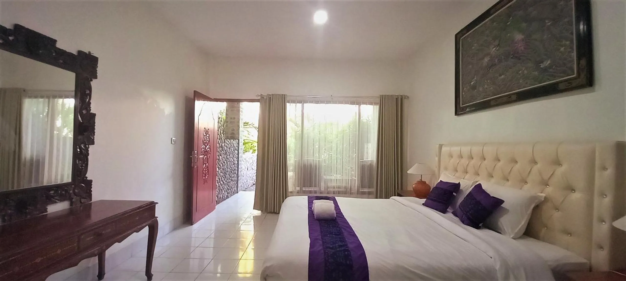 Bed in Matahari Inn Kuta Lombok