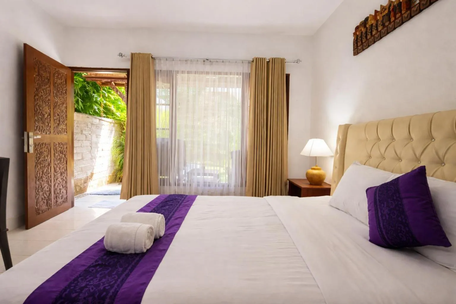 Bed in Matahari Inn Kuta Lombok