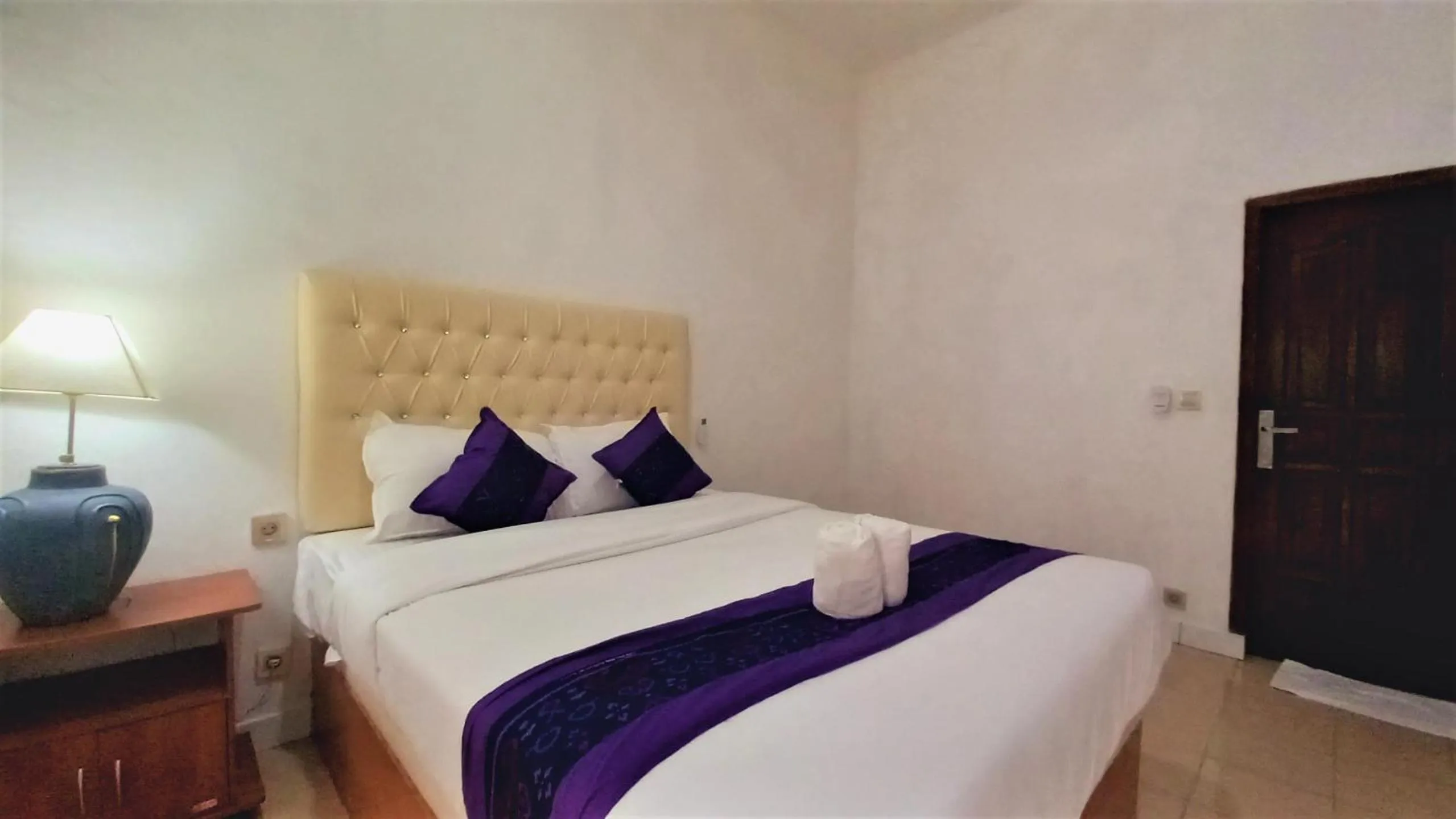 Bed in Matahari Inn Kuta Lombok