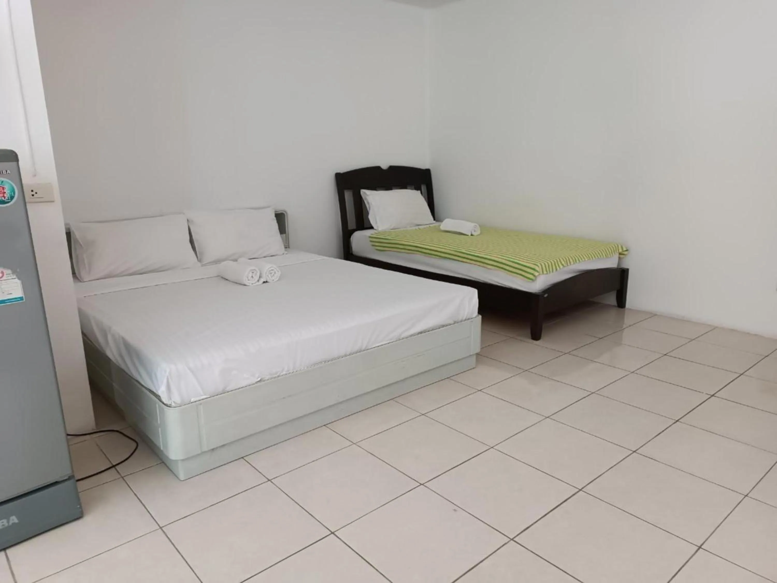 Bedroom, Bed in Grandview Condominia