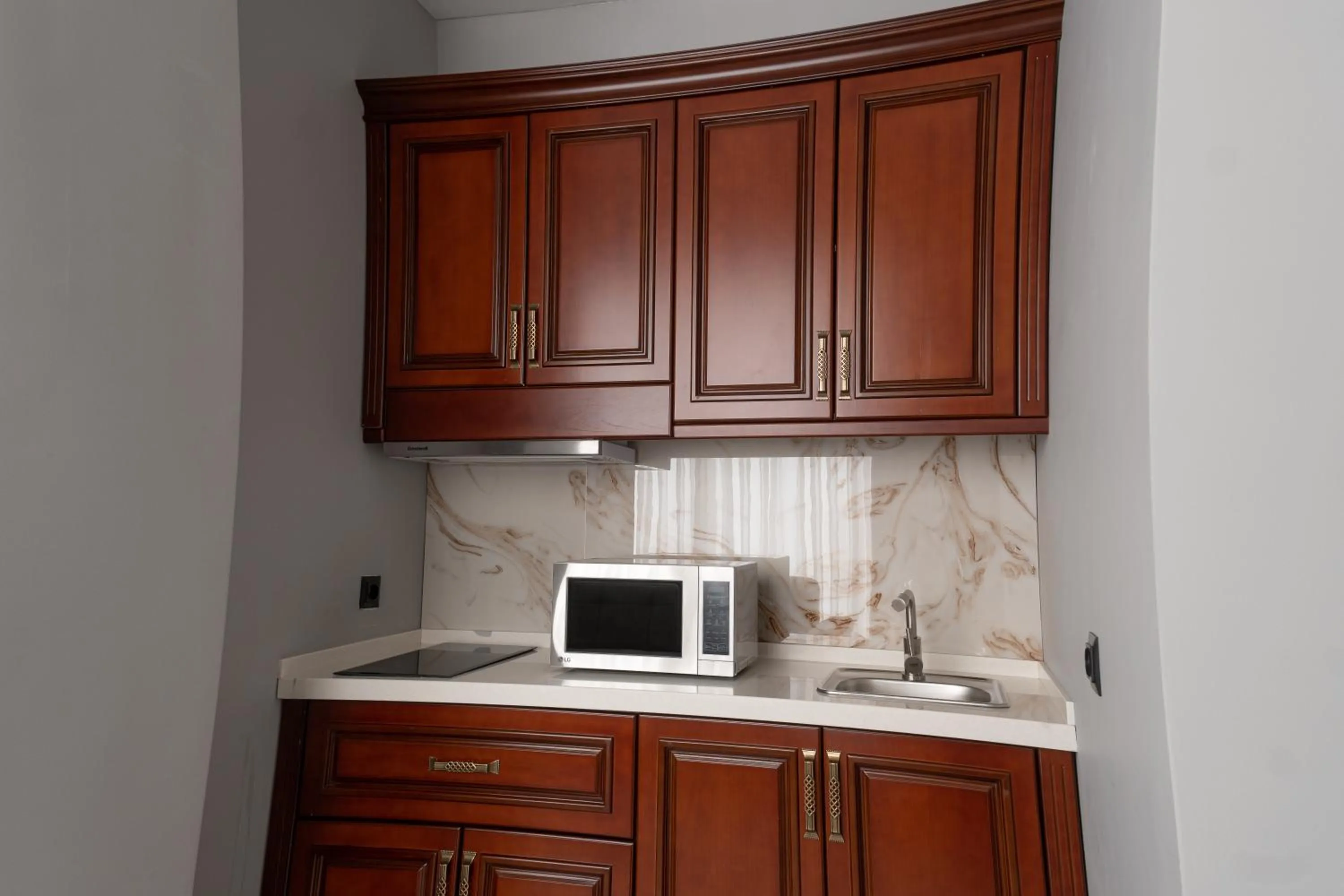 Kitchen or kitchenette in Mir Luxe Plaza