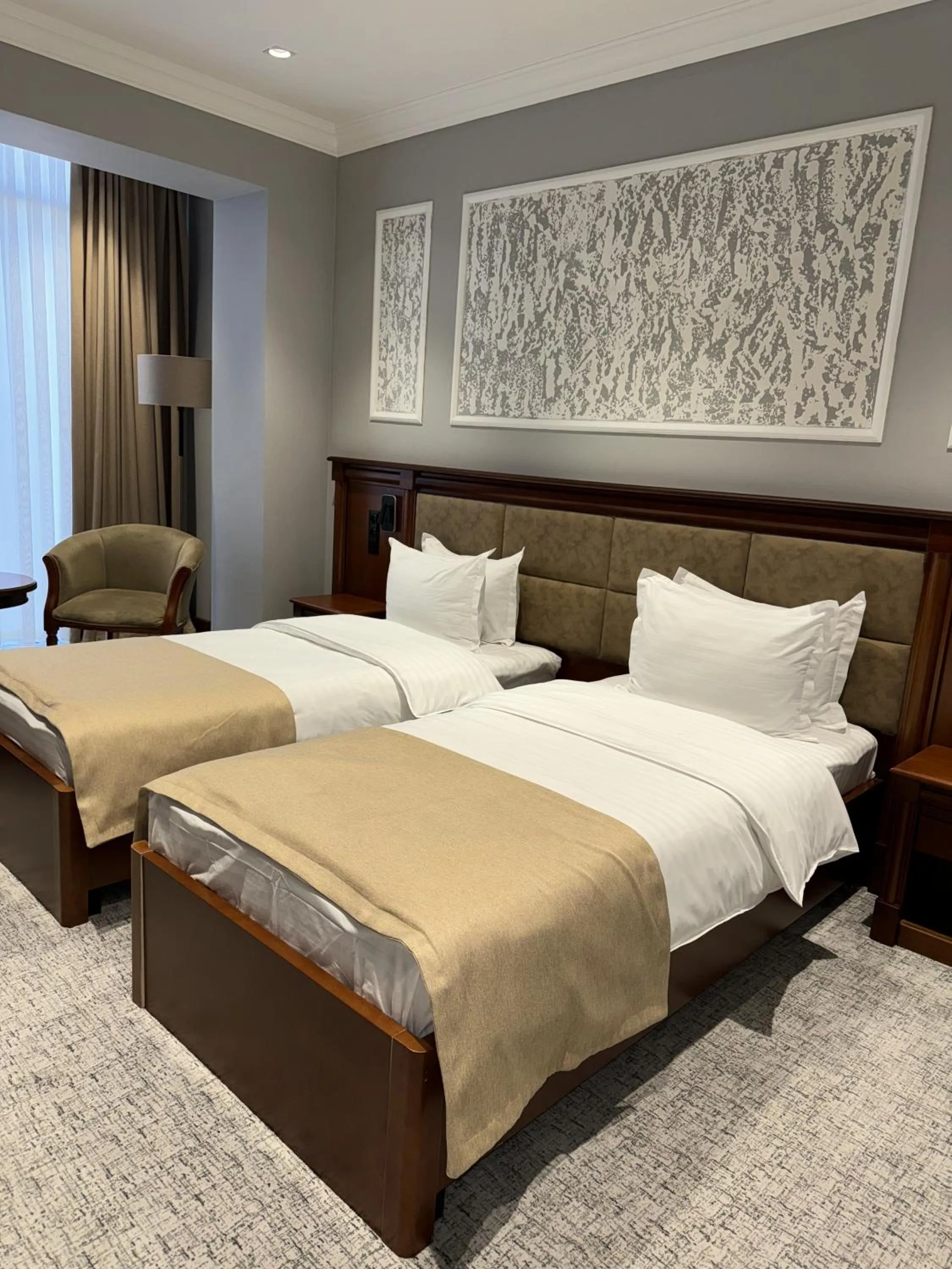 Bed in Mir Luxe Plaza