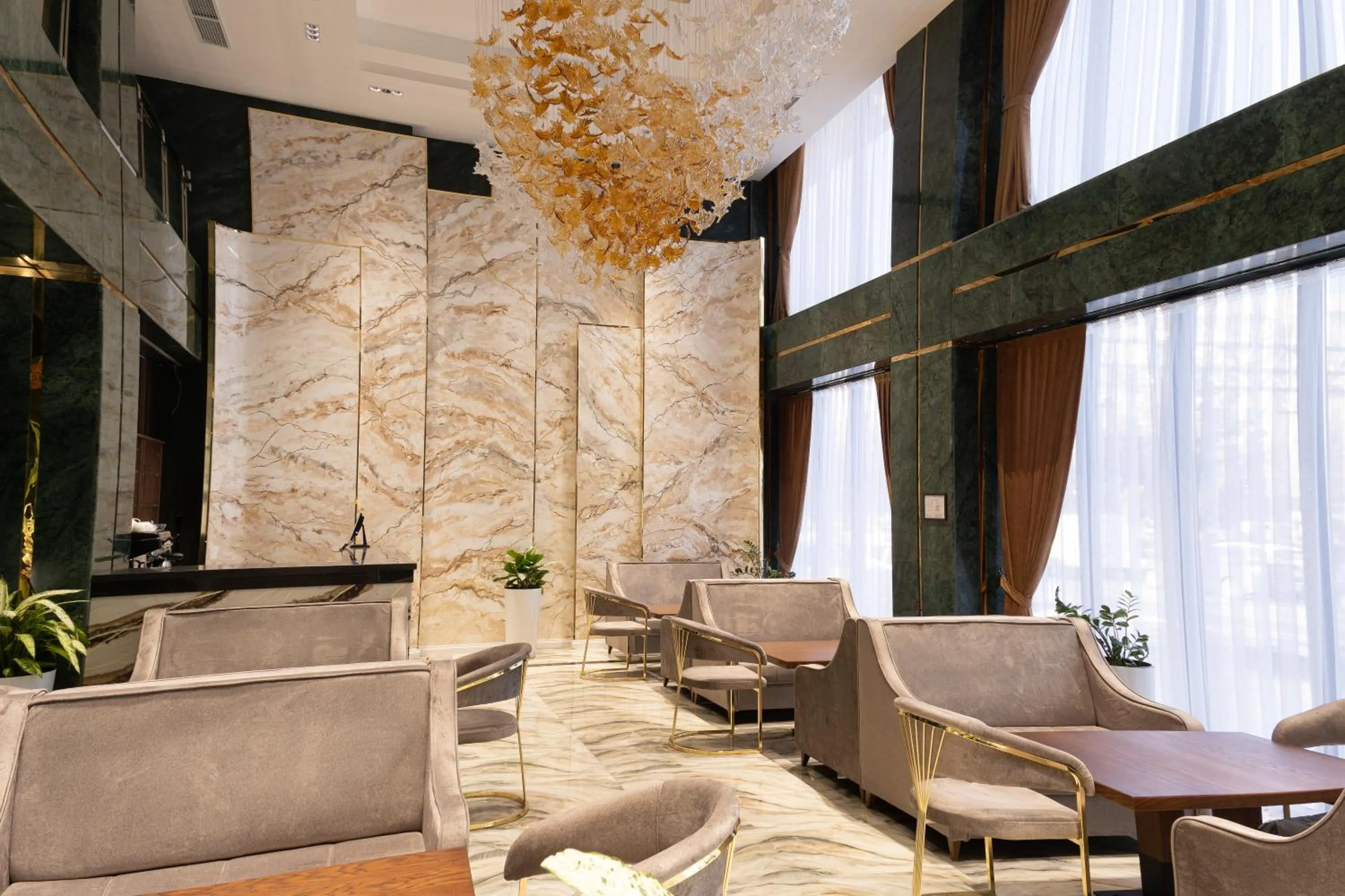 Lounge or bar in Mir Luxe Plaza