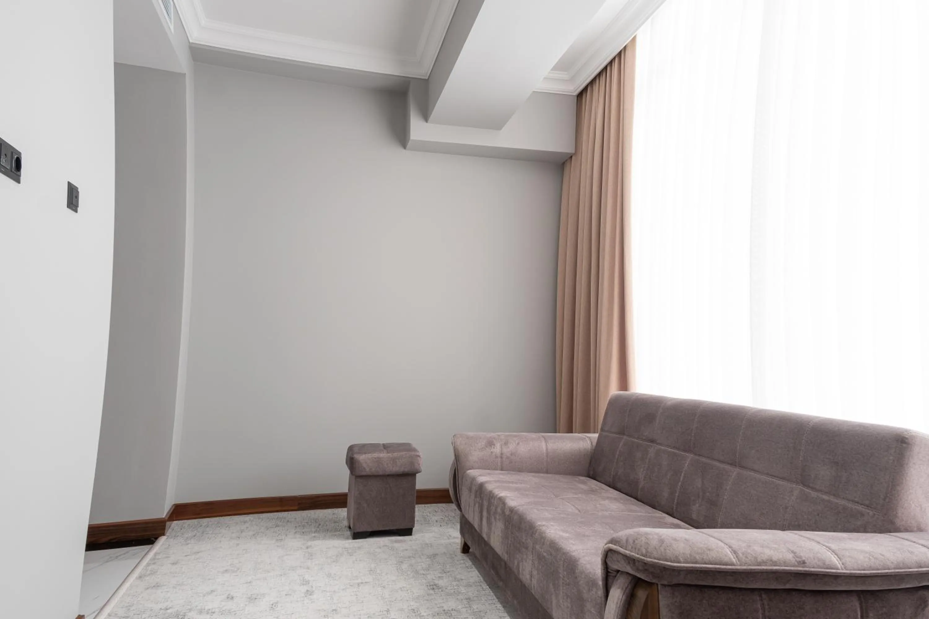 Seating area in Mir Luxe Plaza