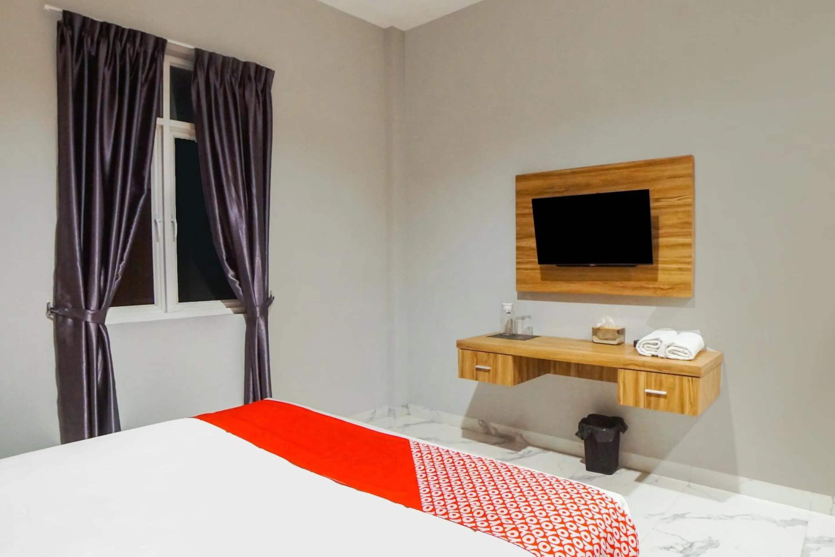 Bedroom, Bed in SUPER OYO Capital O 92066 Papakoel Hotel & Cafe