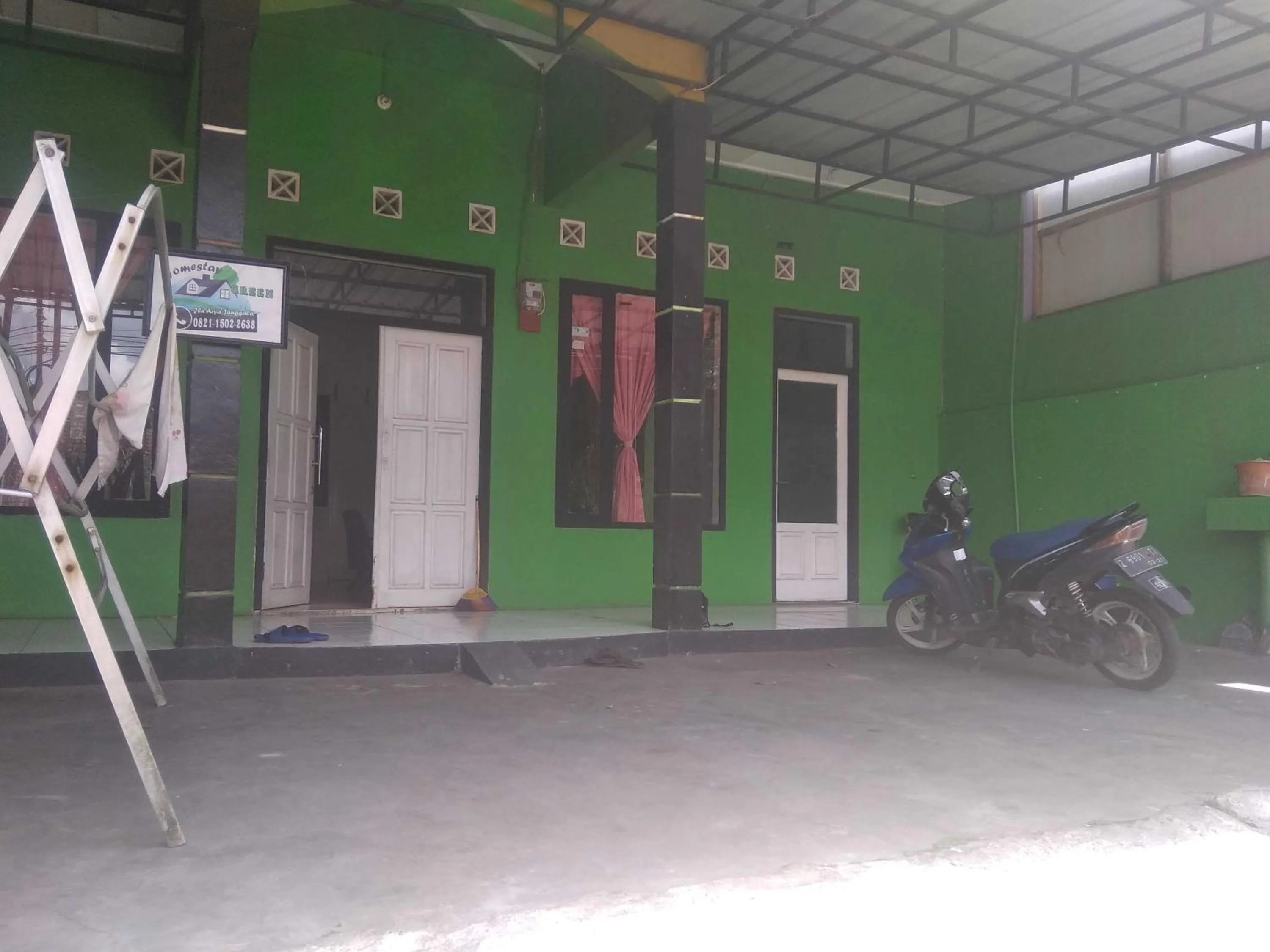 Facade/entrance in Capital O 92080 Green Home Stay