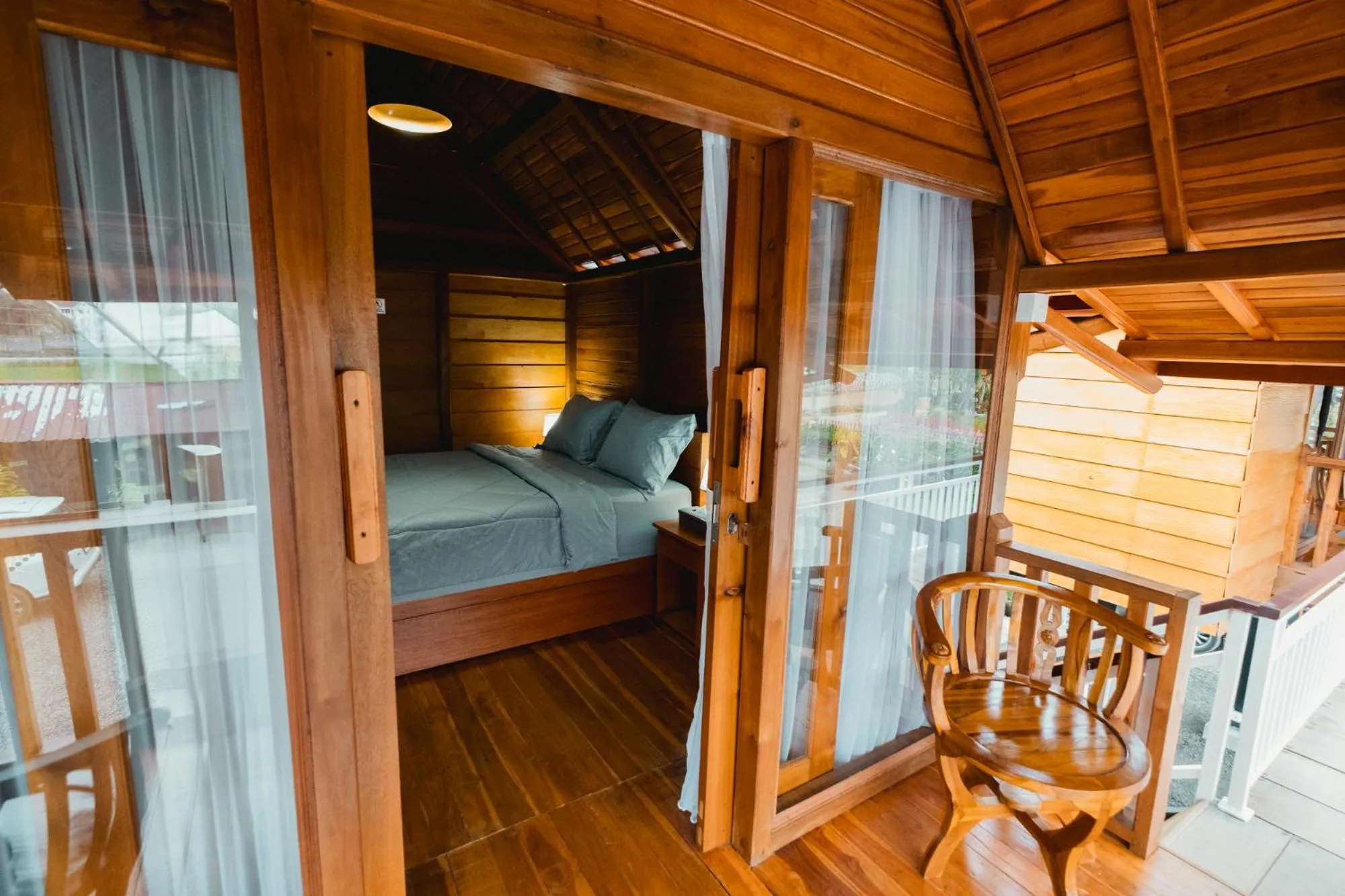 Balcony/Terrace, Bed in The Polumb Garden Bedugul