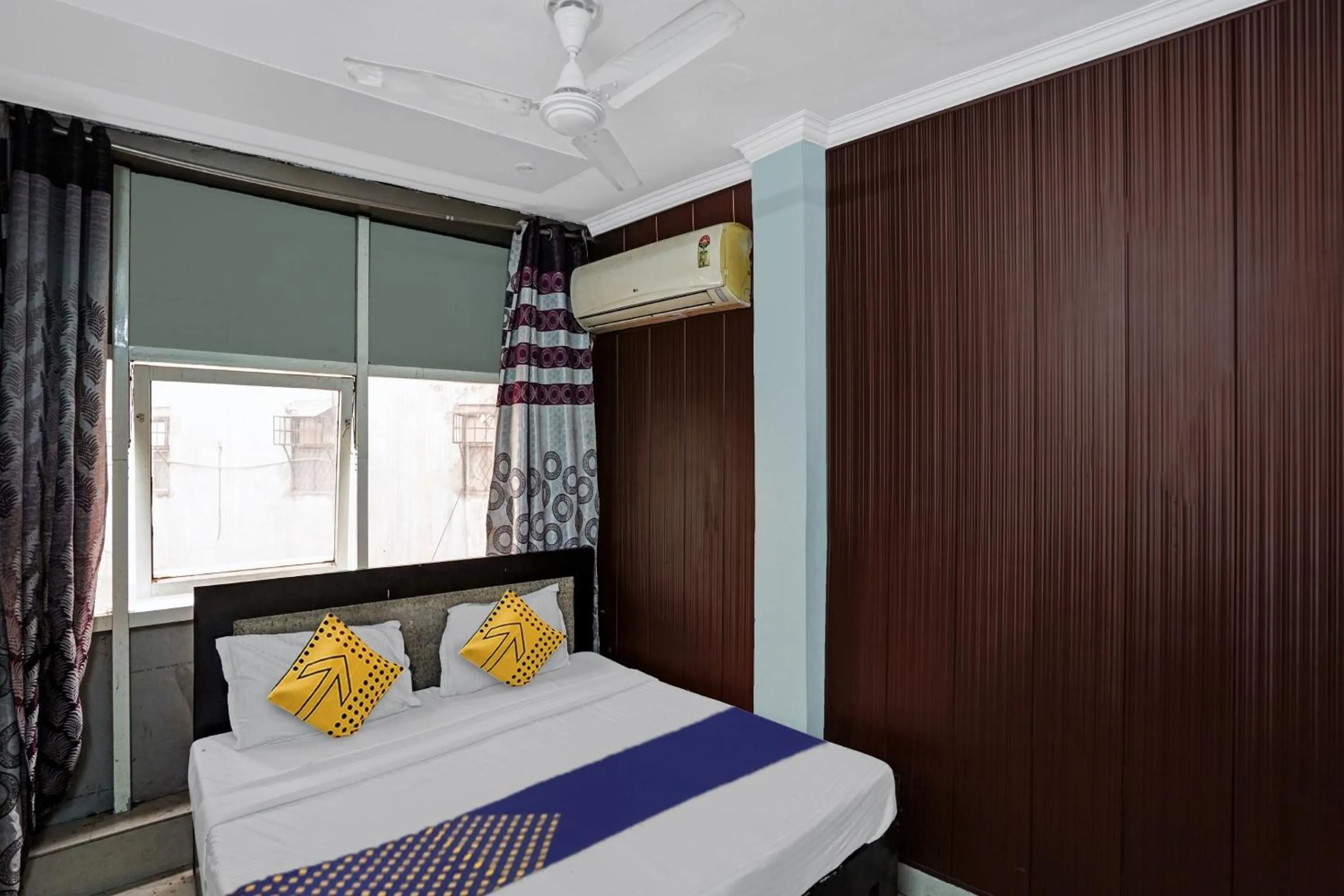 Facade/entrance, Bed in Spot On AK Residency