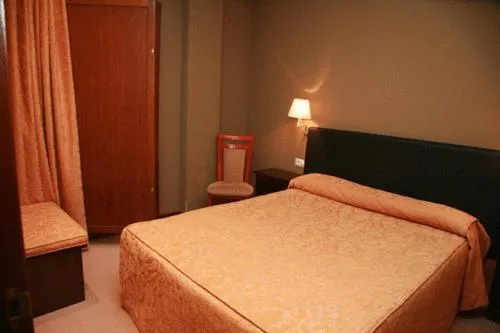 Photo of the whole room, Bed in Gran Hotel Rural Cela