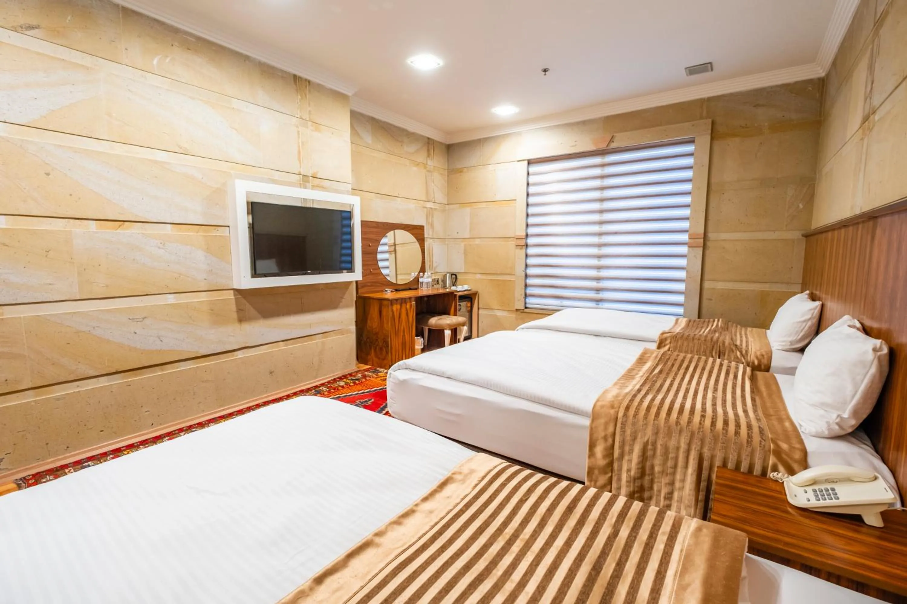Bed in GHERDAN GOLD OTEL