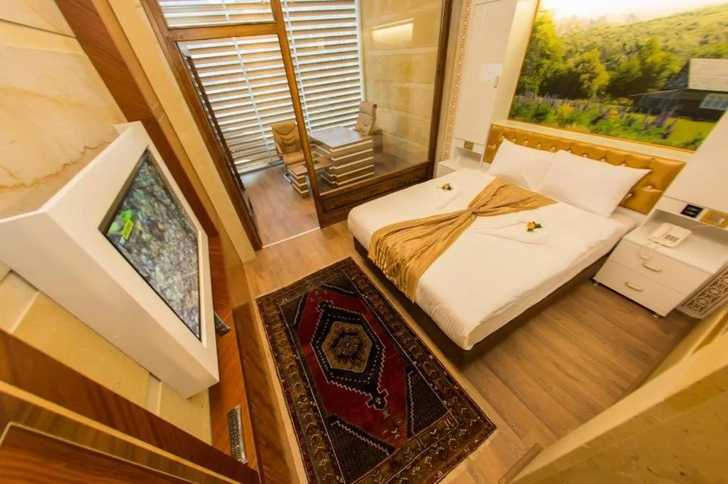 Bed in GHERDAN GOLD OTEL