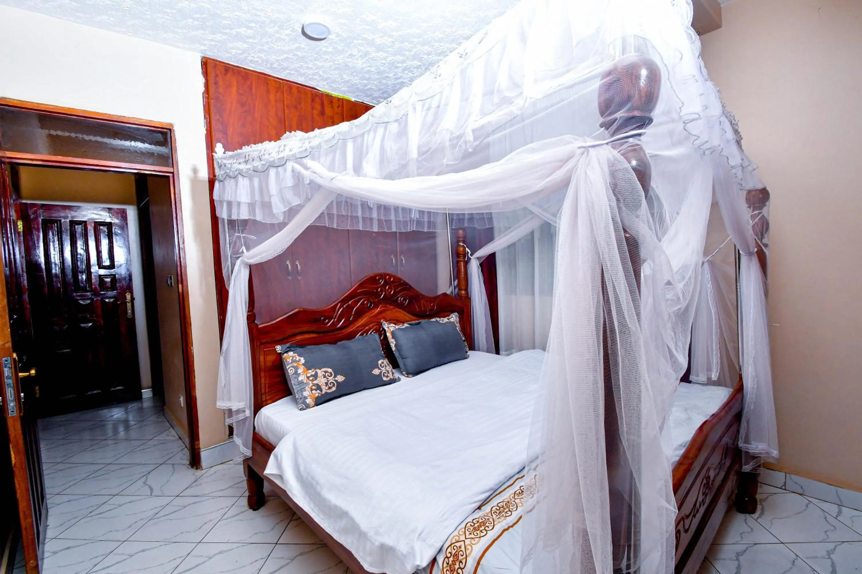 Bed in Peace of Mind Suites