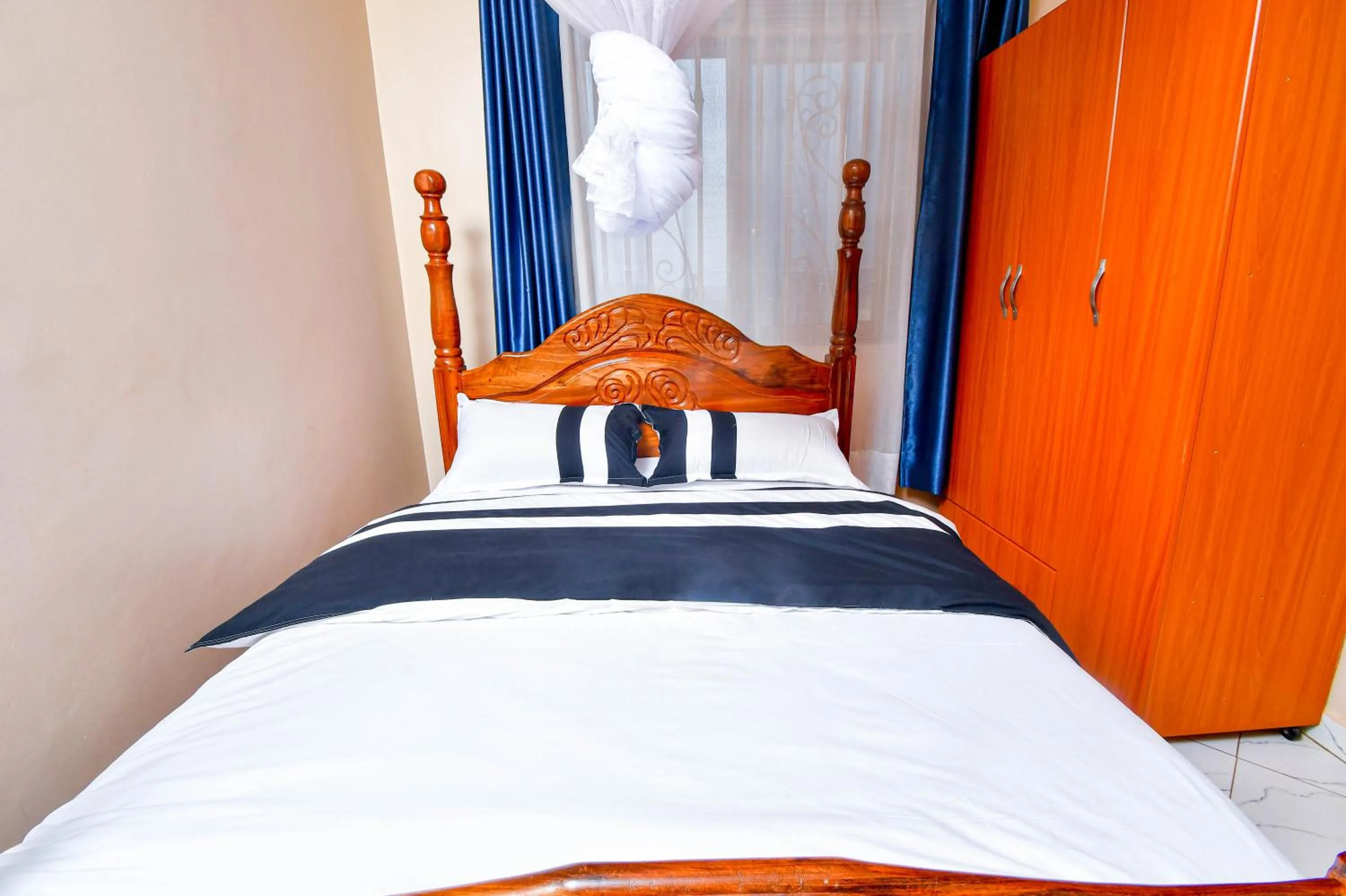 Bed in Peace of Mind Suites