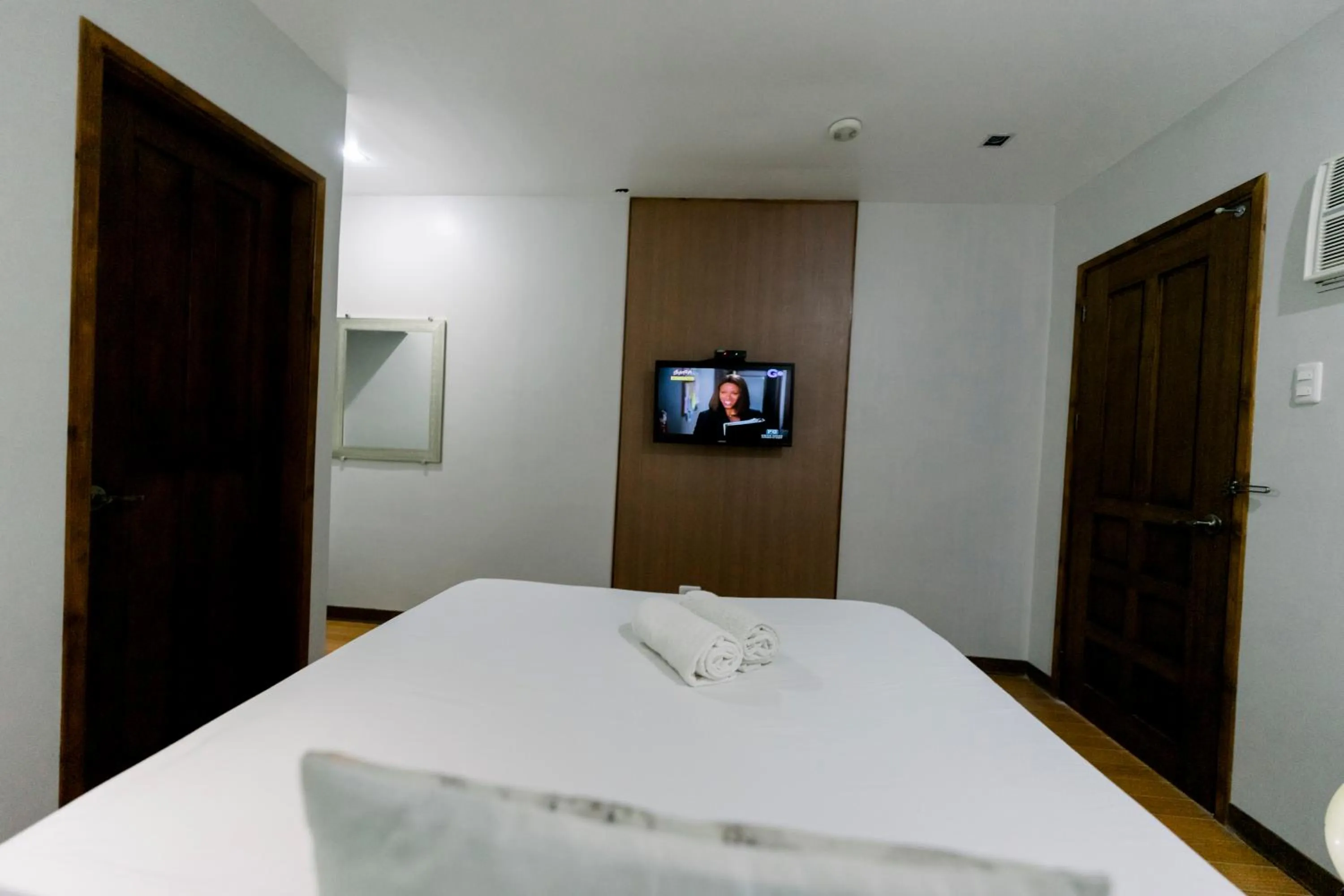 Bed in Madonna Hometel and Suites