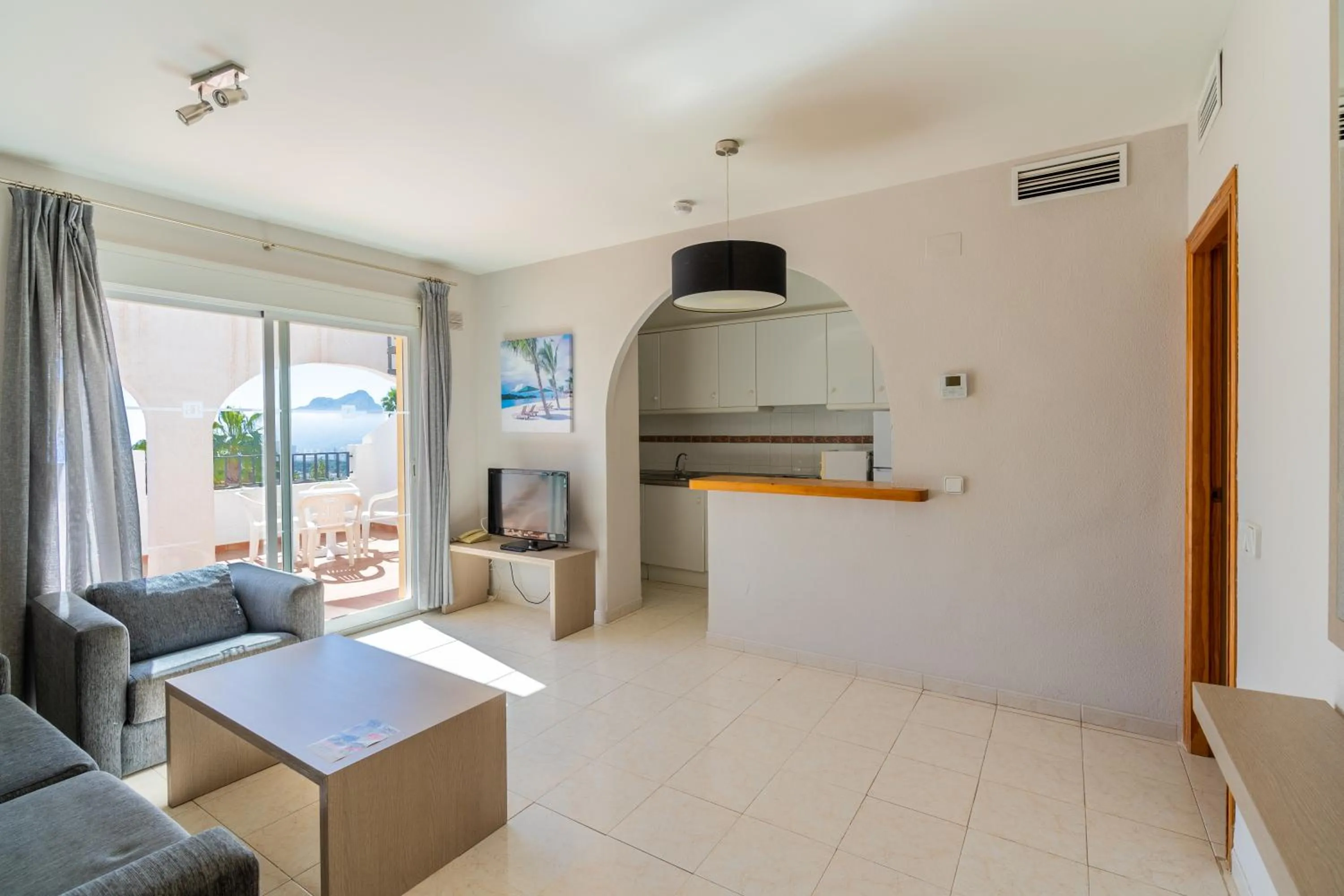 Living room in Bungalows Imperial Park Unitursa