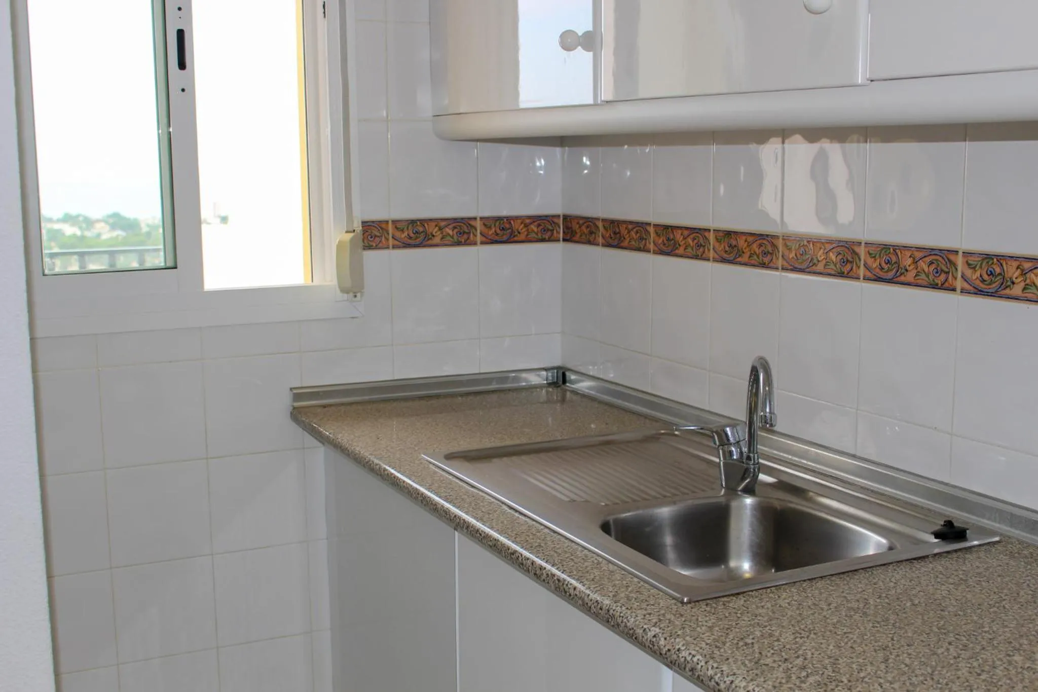 Kitchen or kitchenette in Bungalows Imperial Park Unitursa