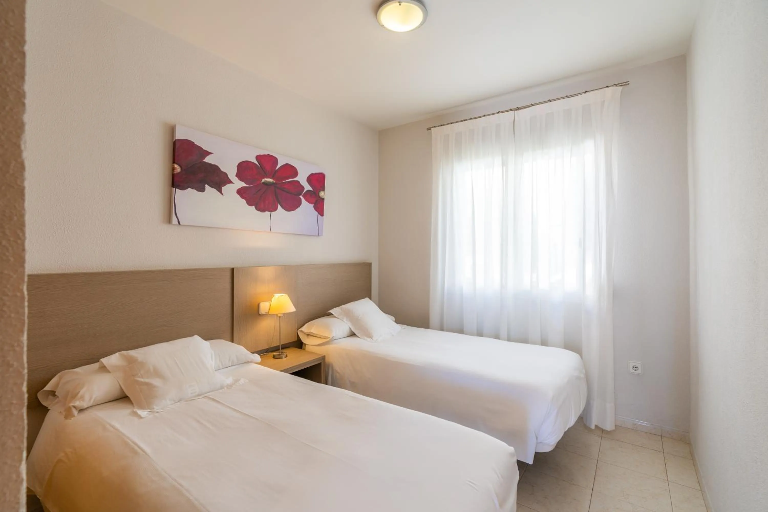 Bed in Bungalows Imperial Park Unitursa