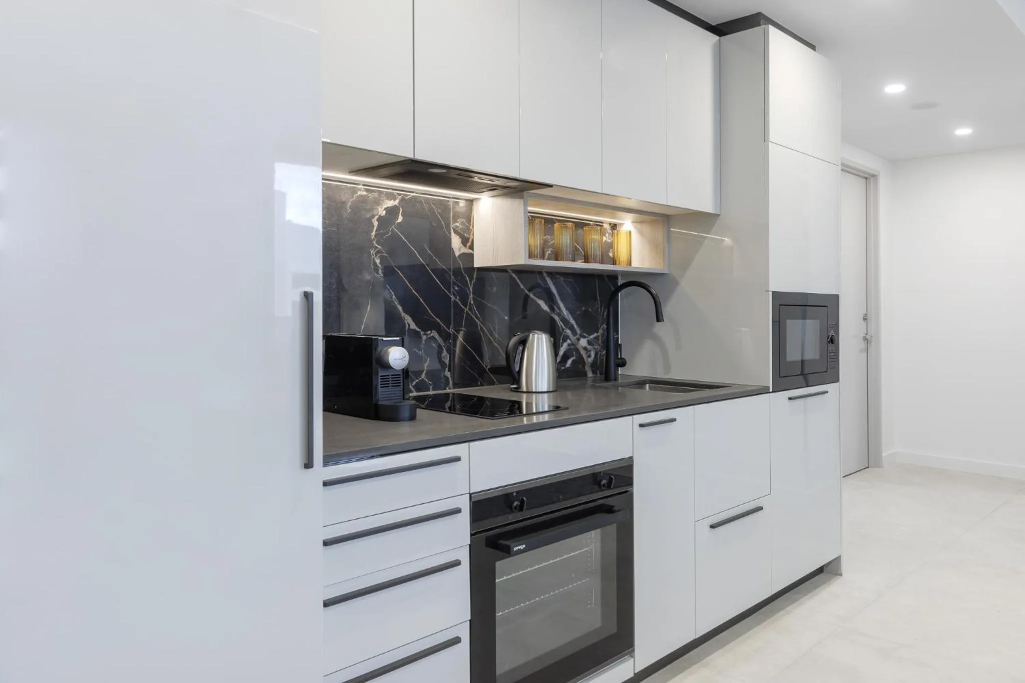 kitchen in Meriton Suites Canberra