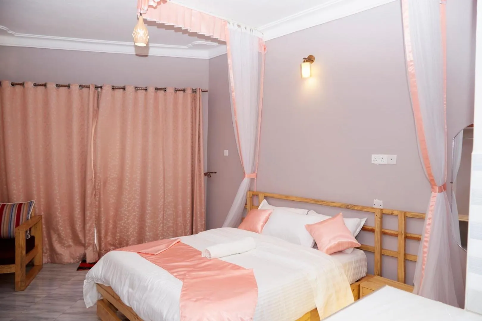 Bed in WestWay Luxury Suites