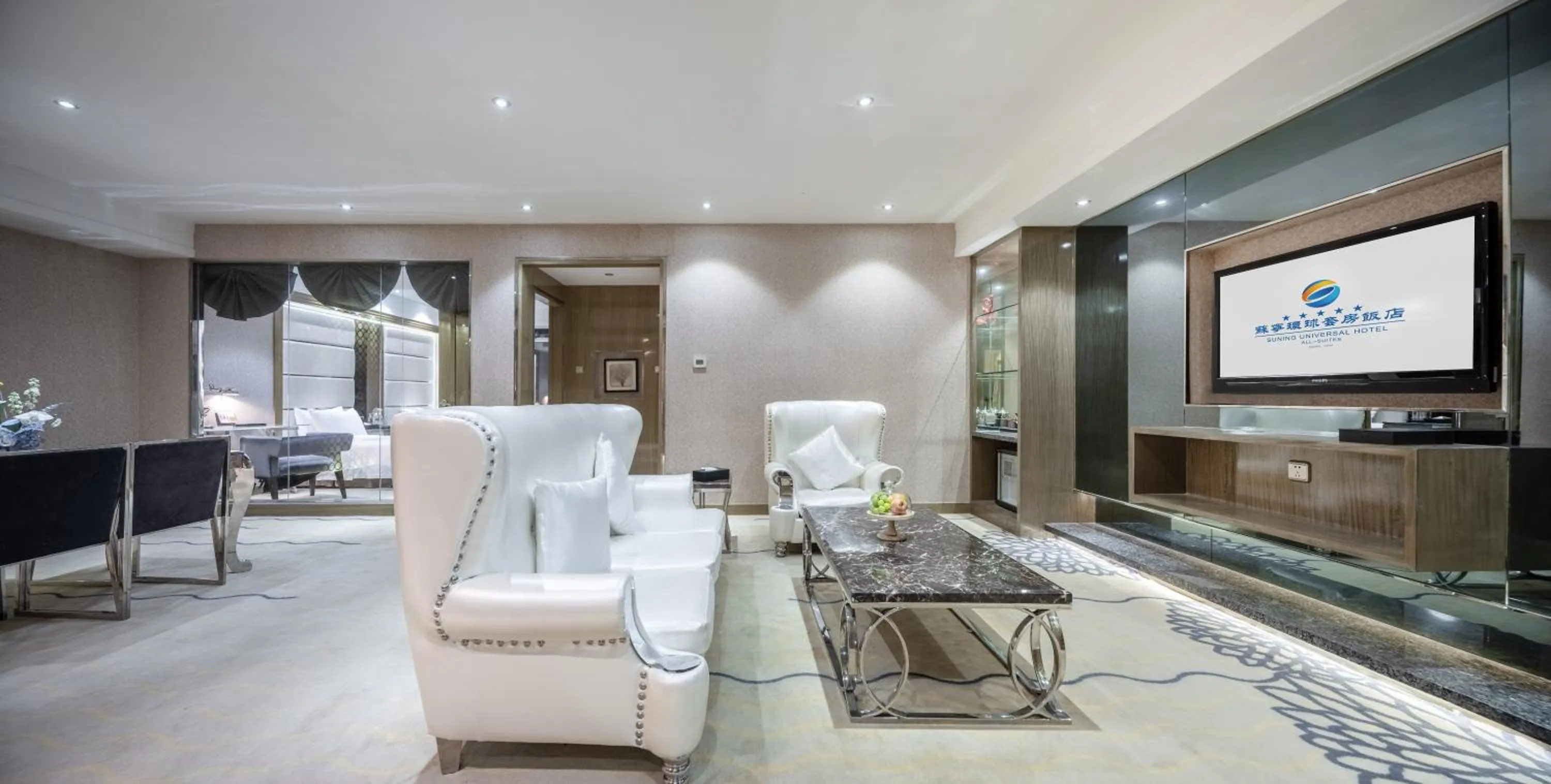 TV and multimedia in Suning Universal Hotel ALL-SUITES