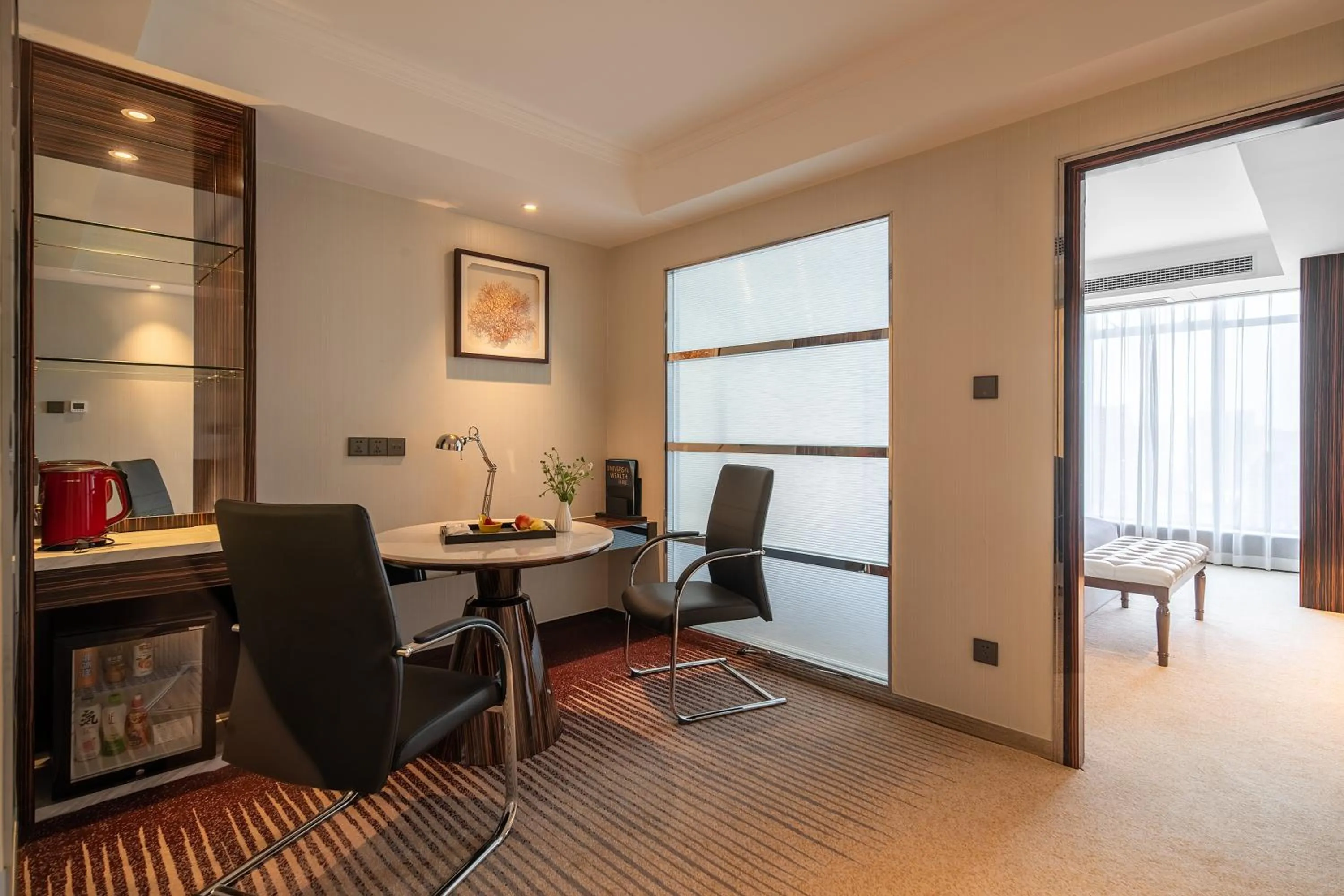 Living room in Suning Universal Hotel ALL-SUITES