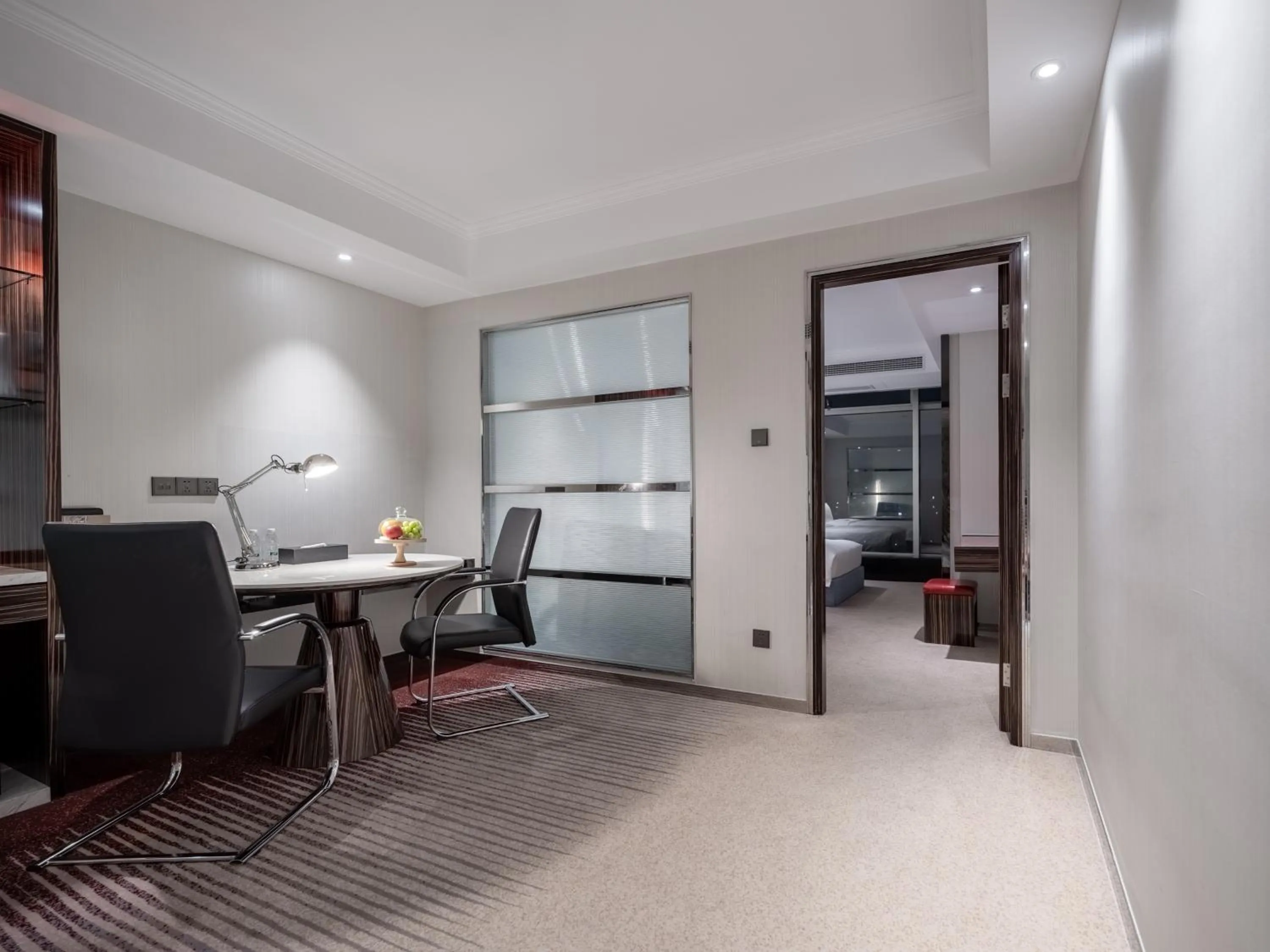 Living room in Suning Universal Hotel ALL-SUITES