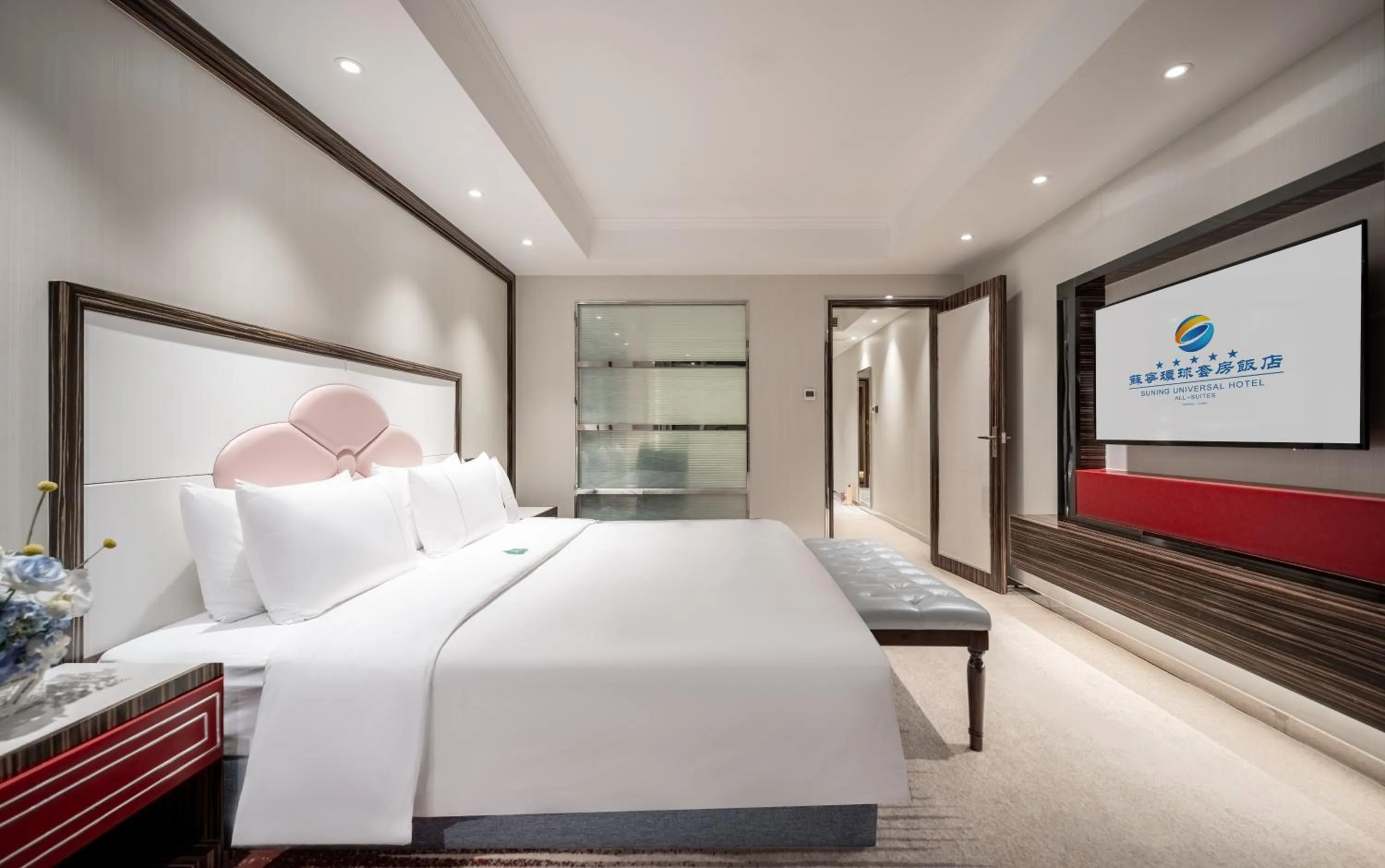 Bed in Suning Universal Hotel ALL-SUITES