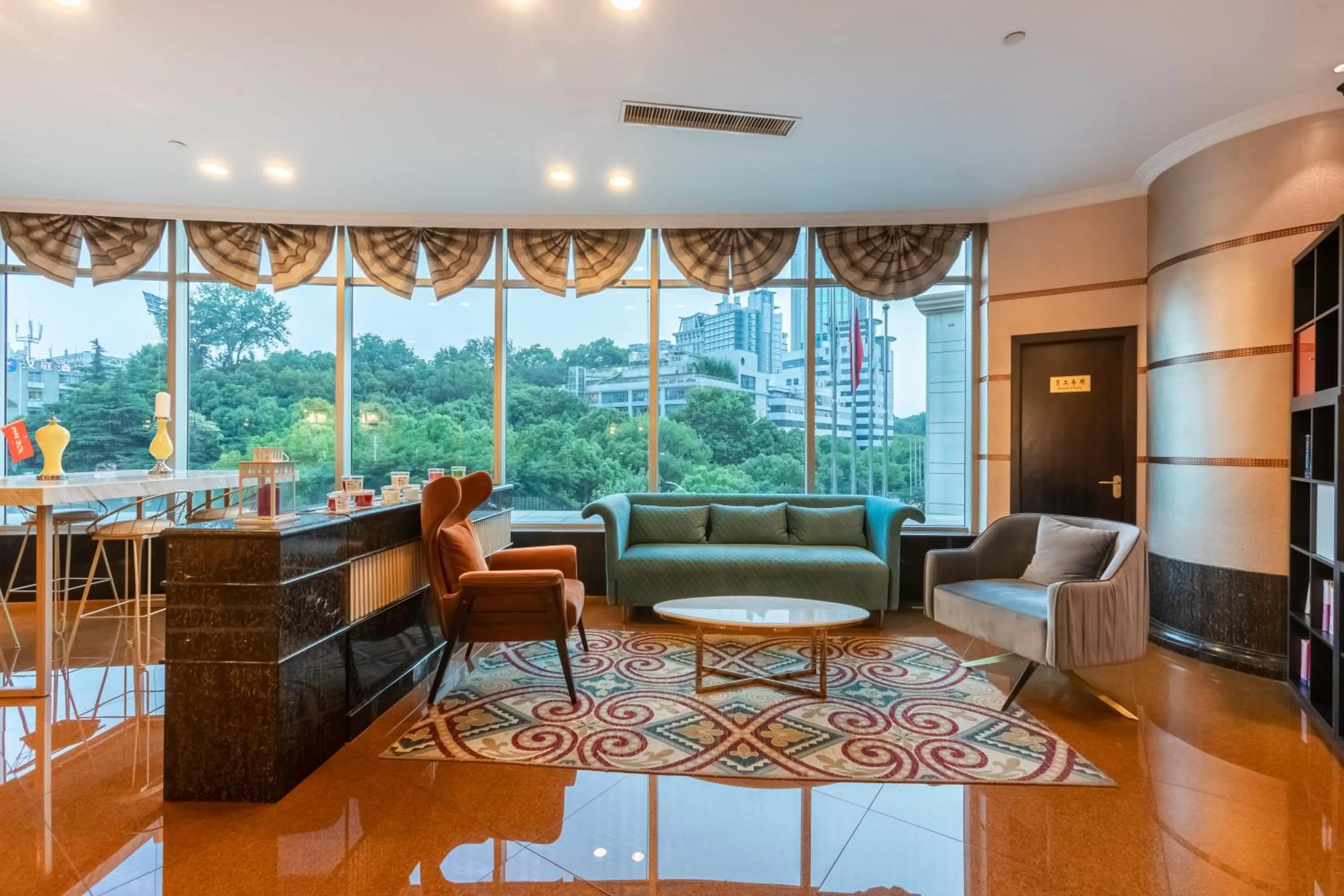 Lobby or reception in Suning Universal Hotel ALL-SUITES