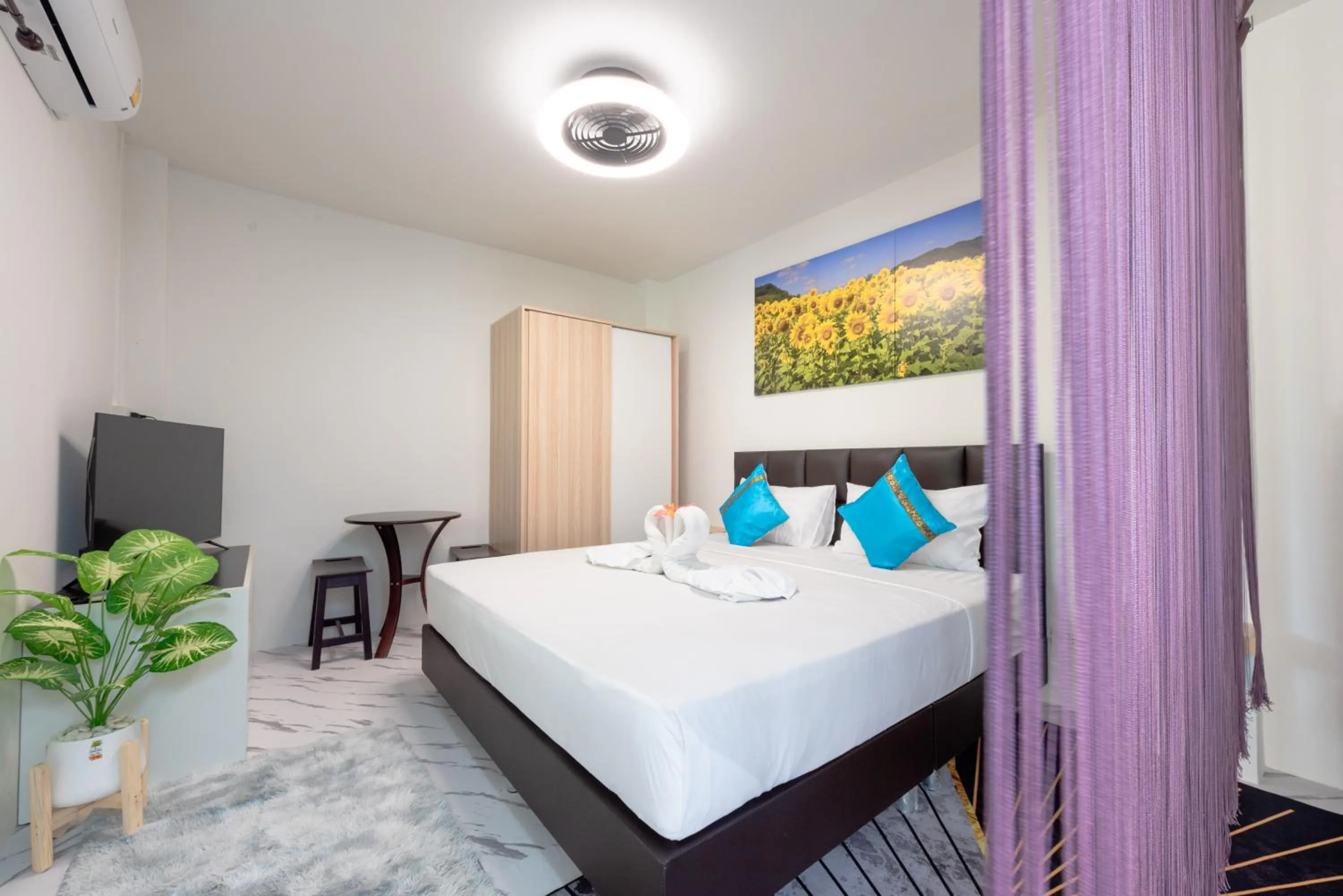 Bed in ฺBaan Waru seaview villa