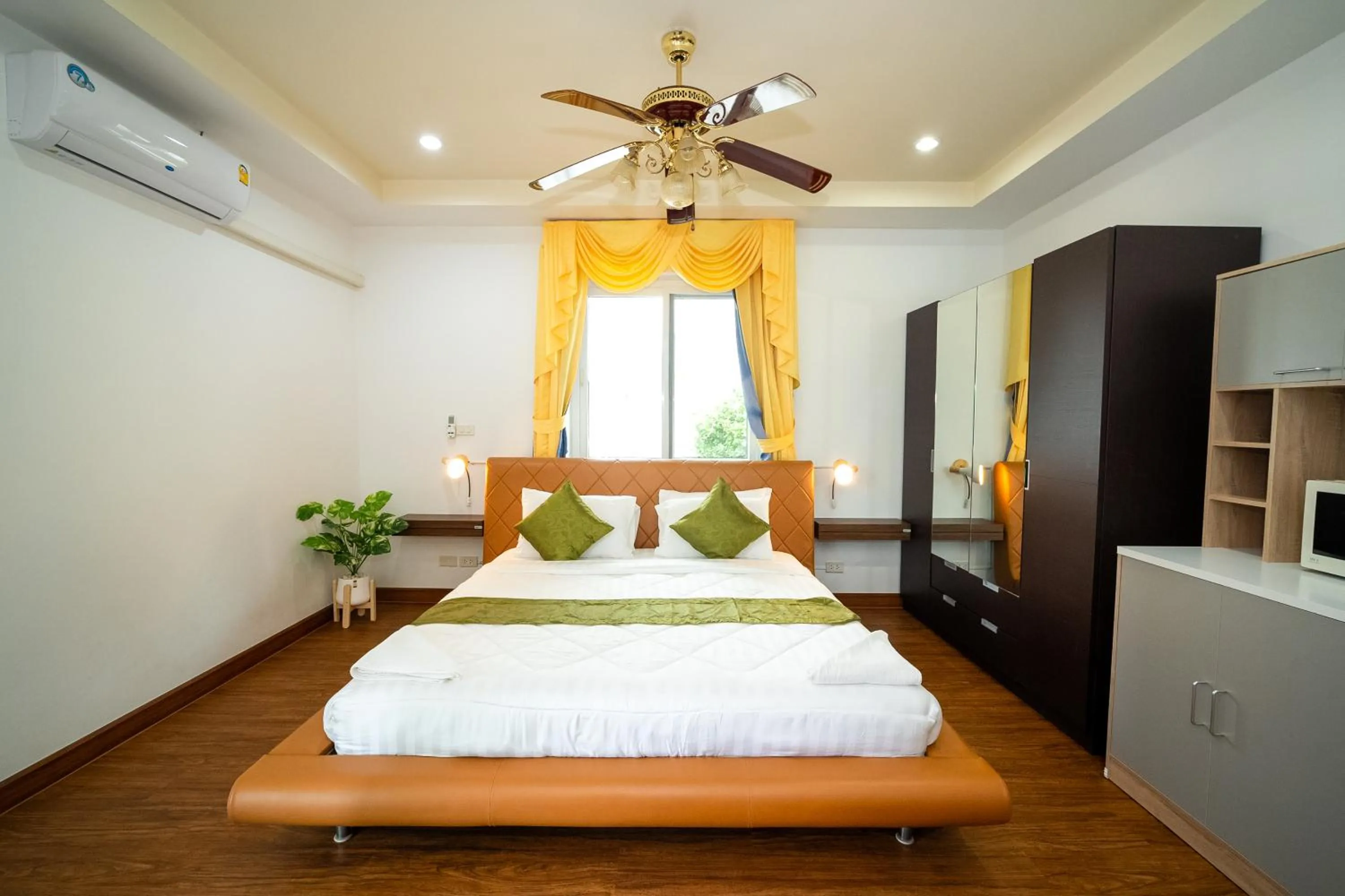 Bed in ฺBaan Waru seaview villa