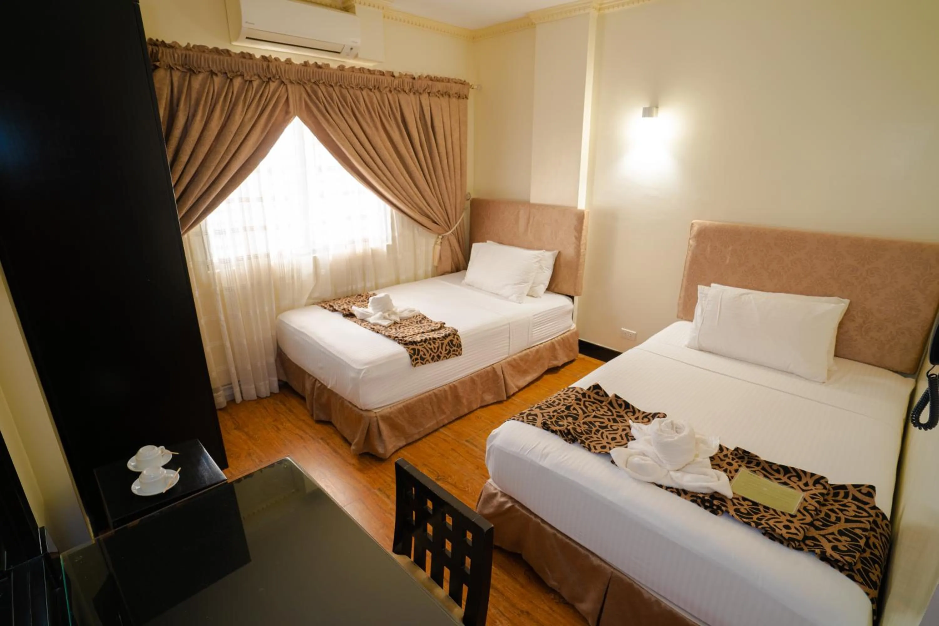 Photo of the whole room, Bed in West Loch Park Hotel Vigan
