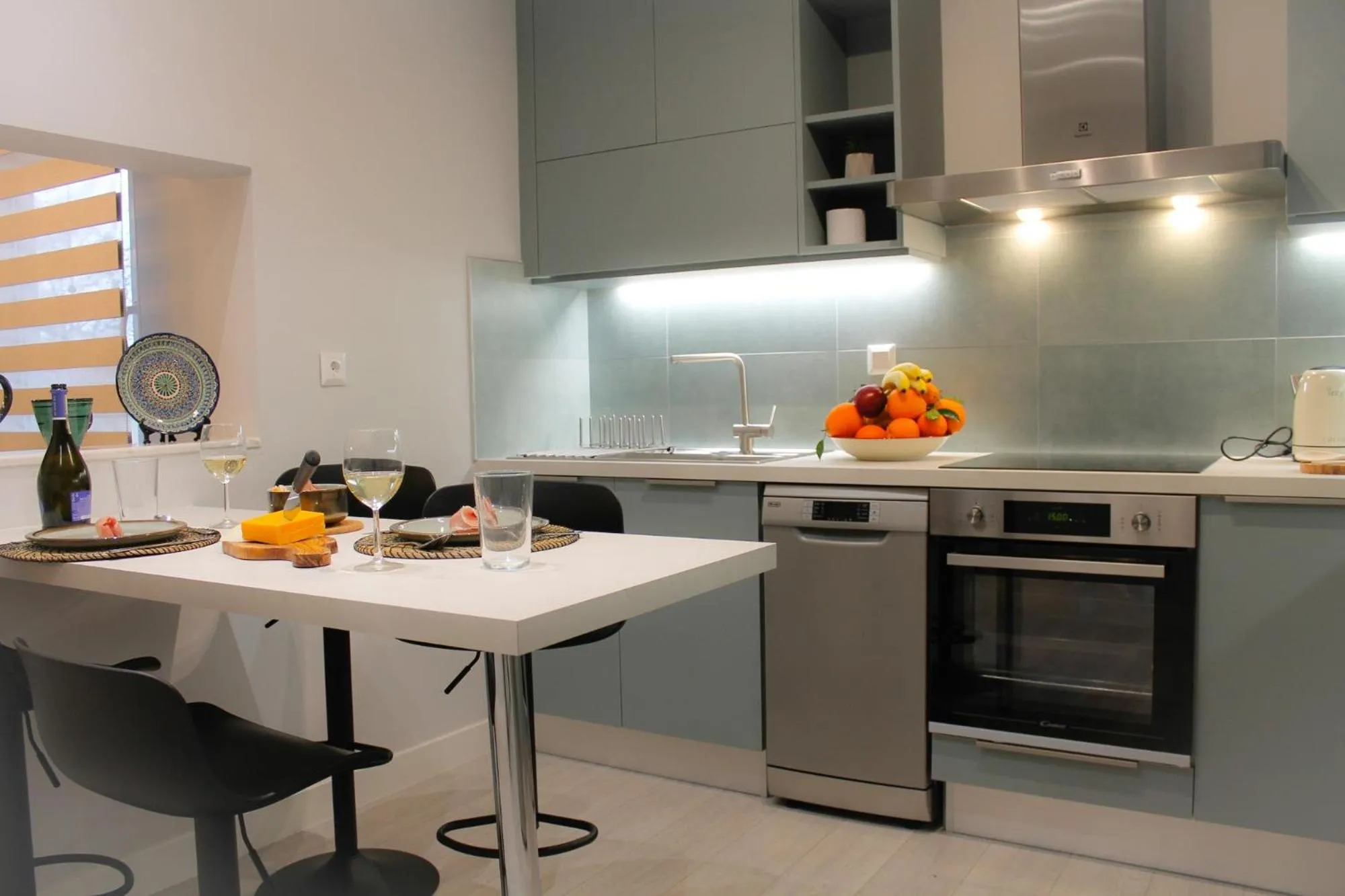 Kitchen or kitchenette in Pelagia Apartment by Kormaris