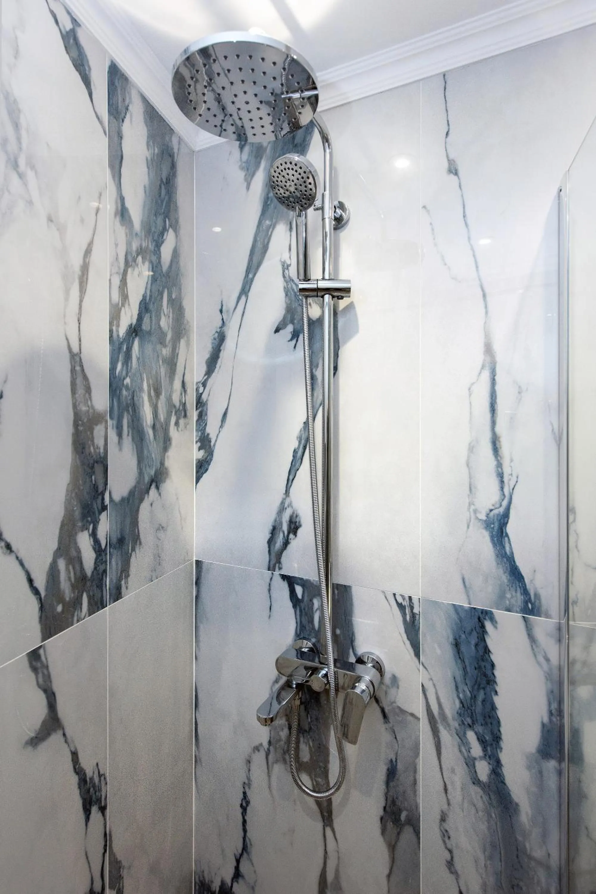 Shower in Pelagia Apartment by Kormaris